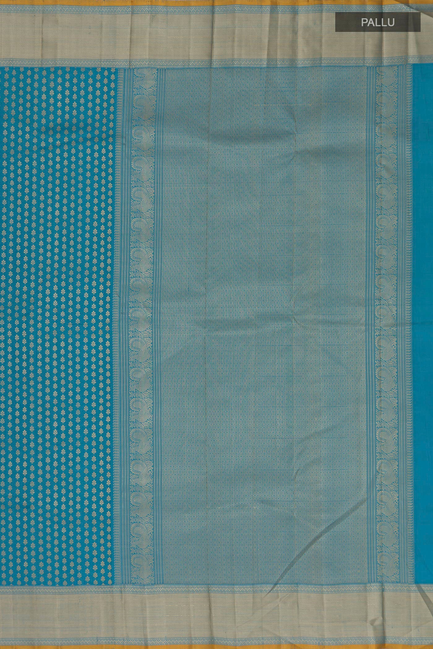 Close up image of the pallu of Blue Kanchipuram Silk Saree with Thread Butta on the body and Thread Border. 