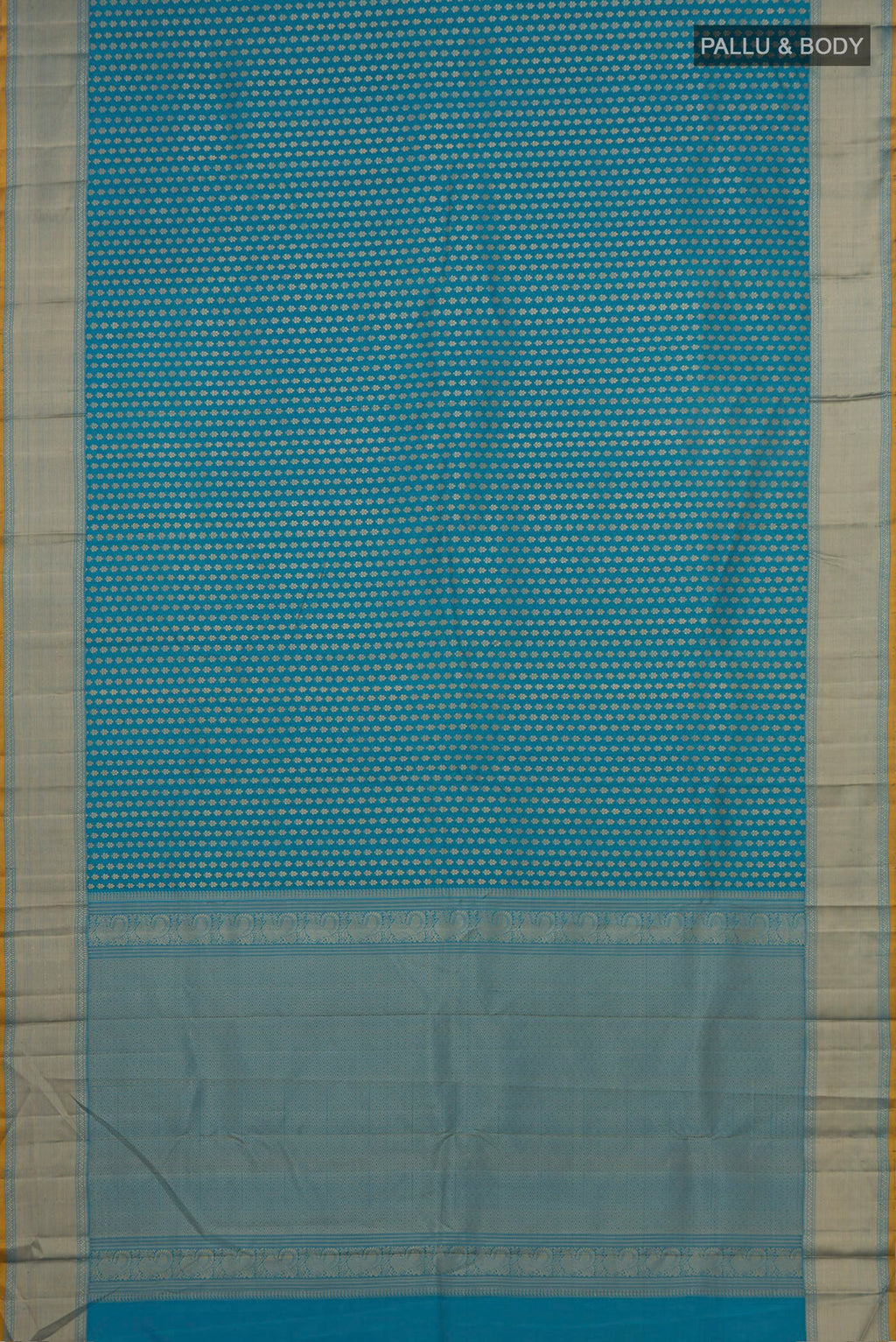 Flat view of Blue Kanchipuram Silk Saree with Thread Butta on the body and Thread Border. 
