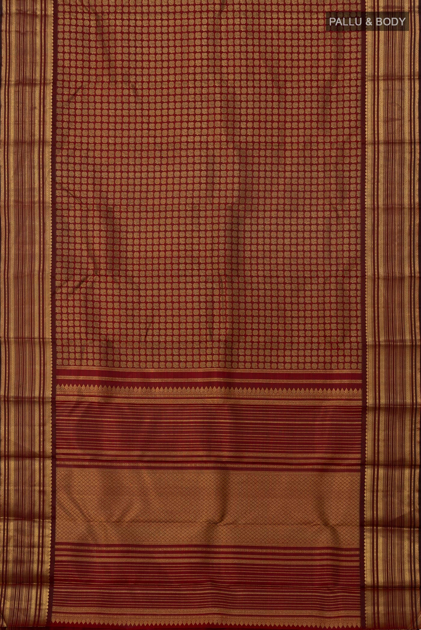 Flat view of Pure Silk Pure Zari Maroon Kanjivaram Saree with Zari Brocade on the body and Zari Border. 