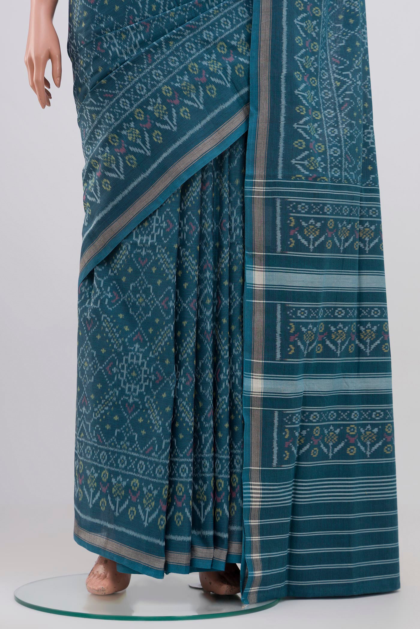 Pleats and pallu of Blue Grey Double Ikat Saree with Ikat design on the body and Plain Border. 