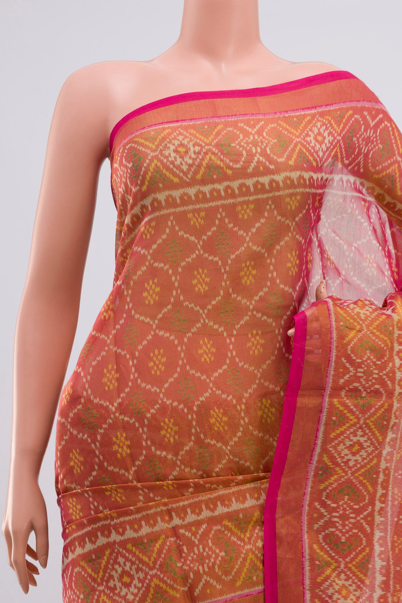 Border image of Pink Rajkot Patola Silk Saree with Ikat design on the body and Zari Border. 