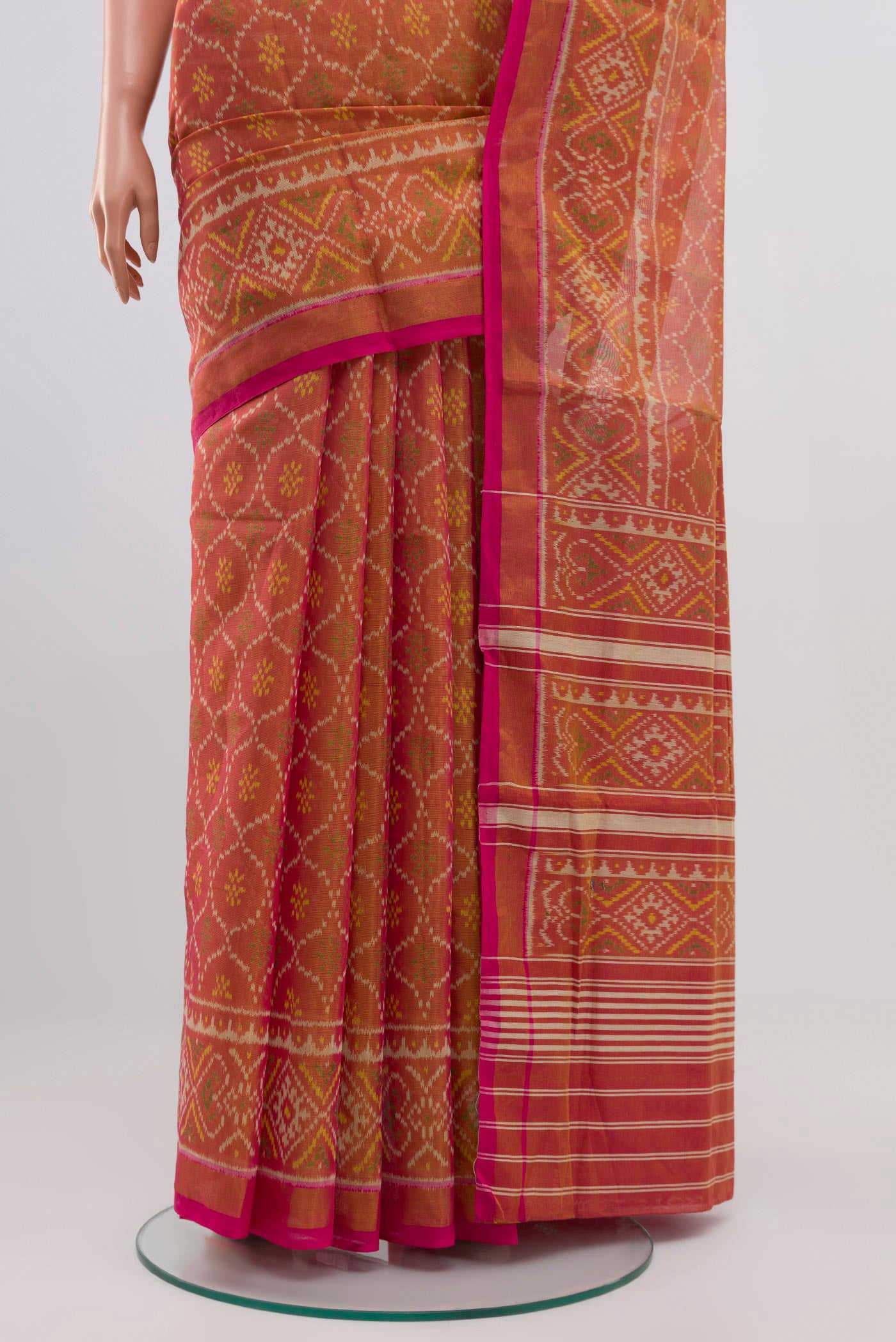 Pleats and pallu of Pink Rajkot Patola Silk Saree with Ikat design on the body and Zari Border. 