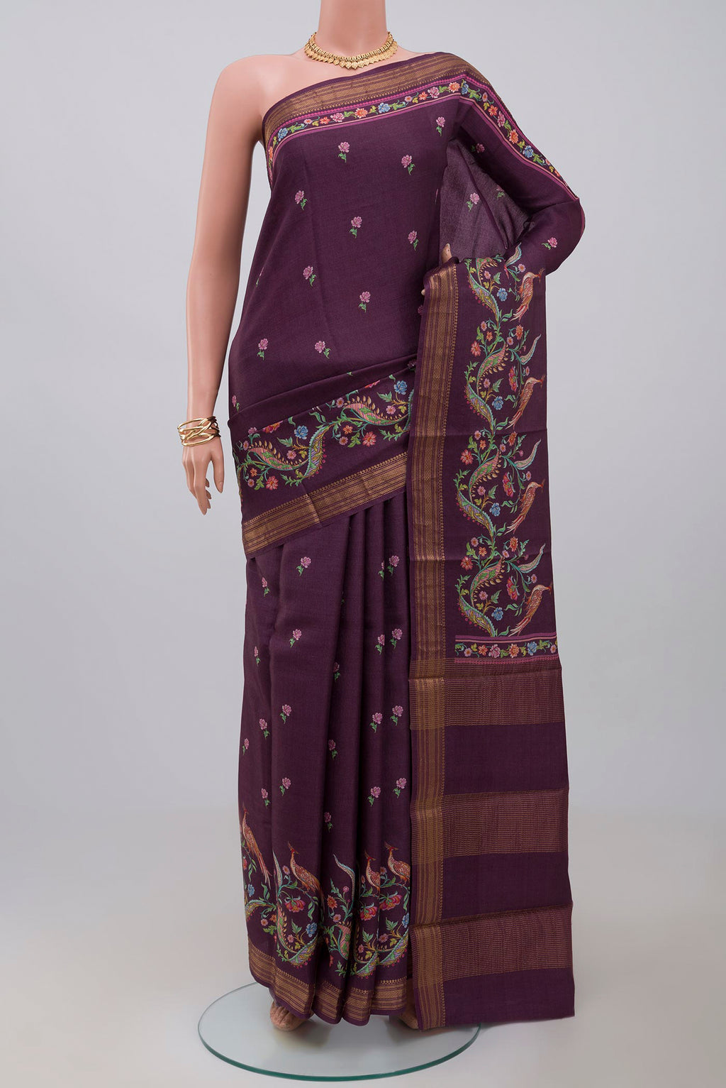 Purple Tussar Saree with Fancy on the body and Zari Border.  displayed on a mannequin