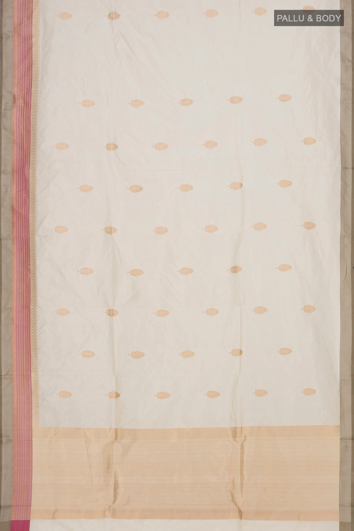 Flat view of Cream Banarasi Katan Silk Saree with Zari Butta on the body and Thin Zari Line. 