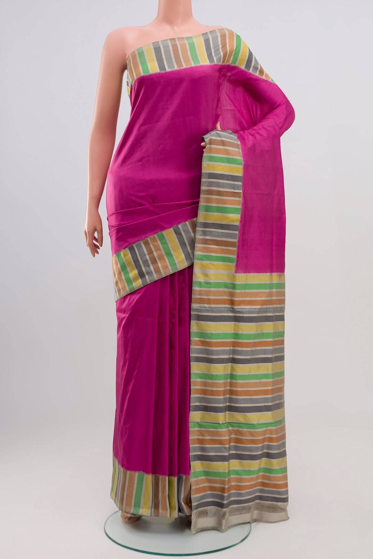 Pink Pochampally Silk Saree with Plain Body and Plain Border.  displayed on a mannequin