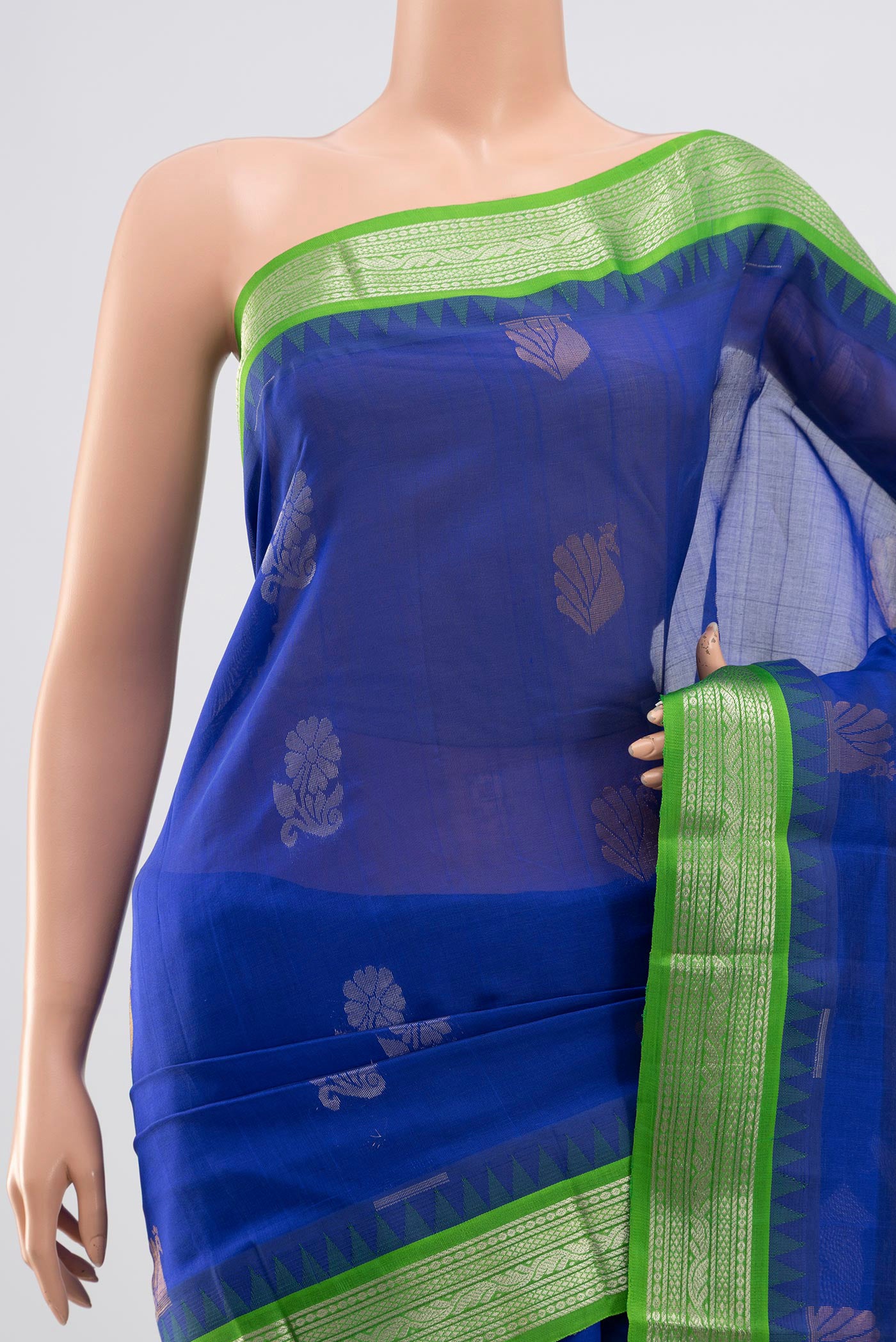 Border image of Blue Silk Cotton Saree with Zari Butta on the body and Zari Border. 