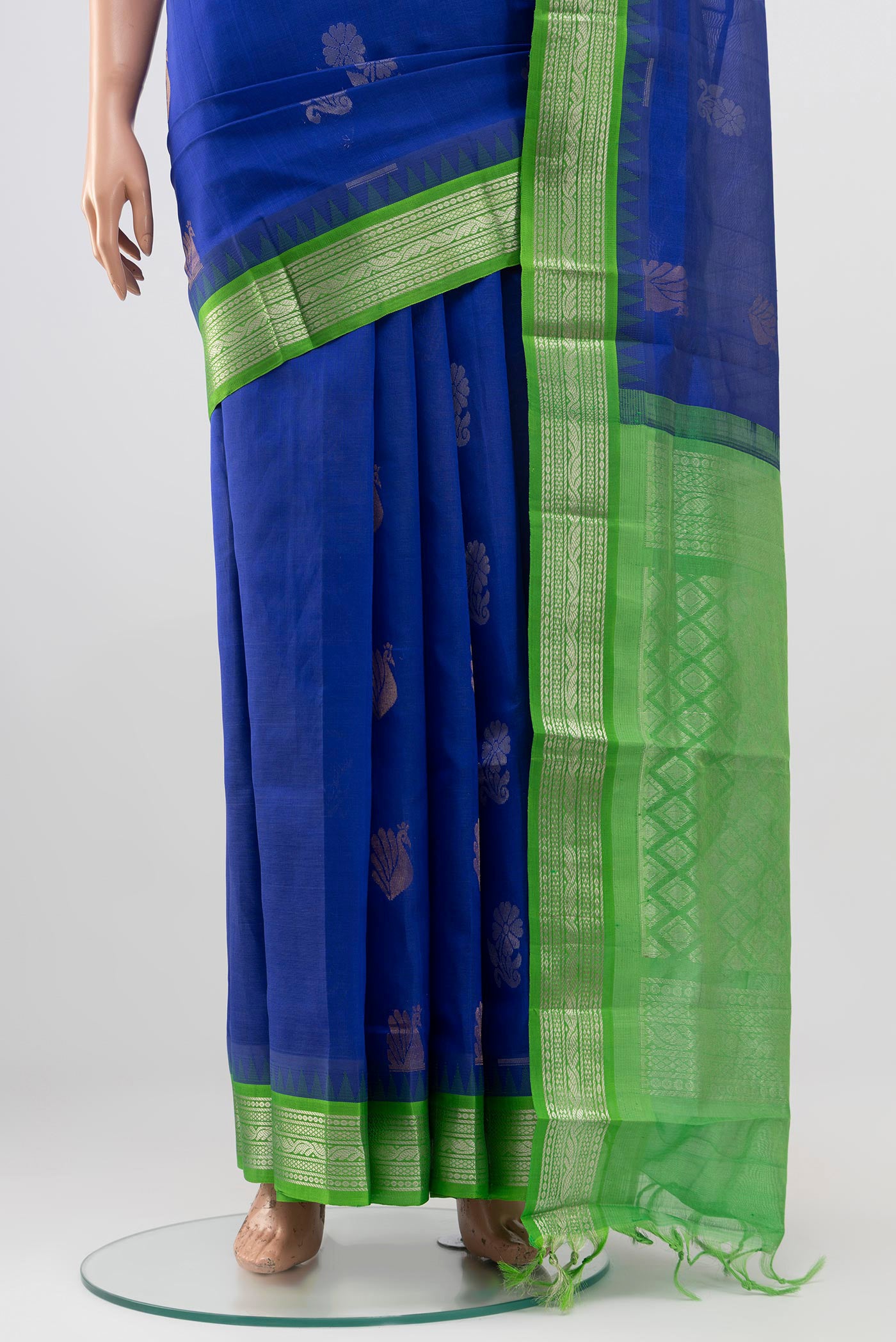 Pleats and pallu of Blue Silk Cotton Saree with Zari Butta on the body and Zari Border. 