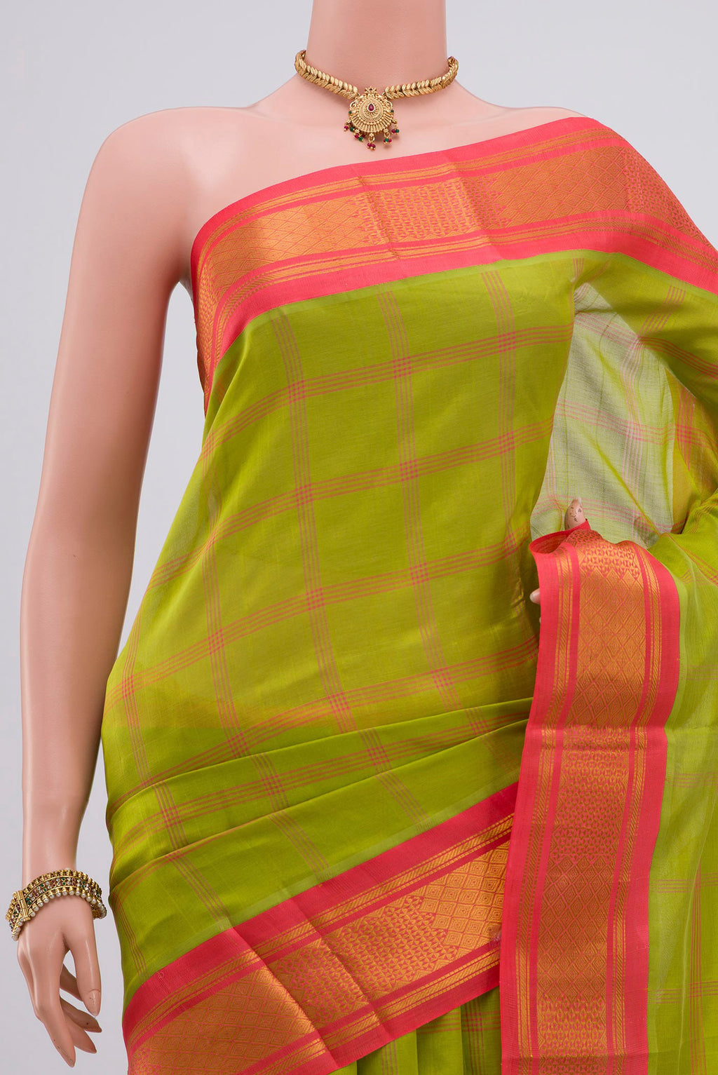 Border image of Green Silk Cotton Saree with Checked design on the body and Zari Border. 