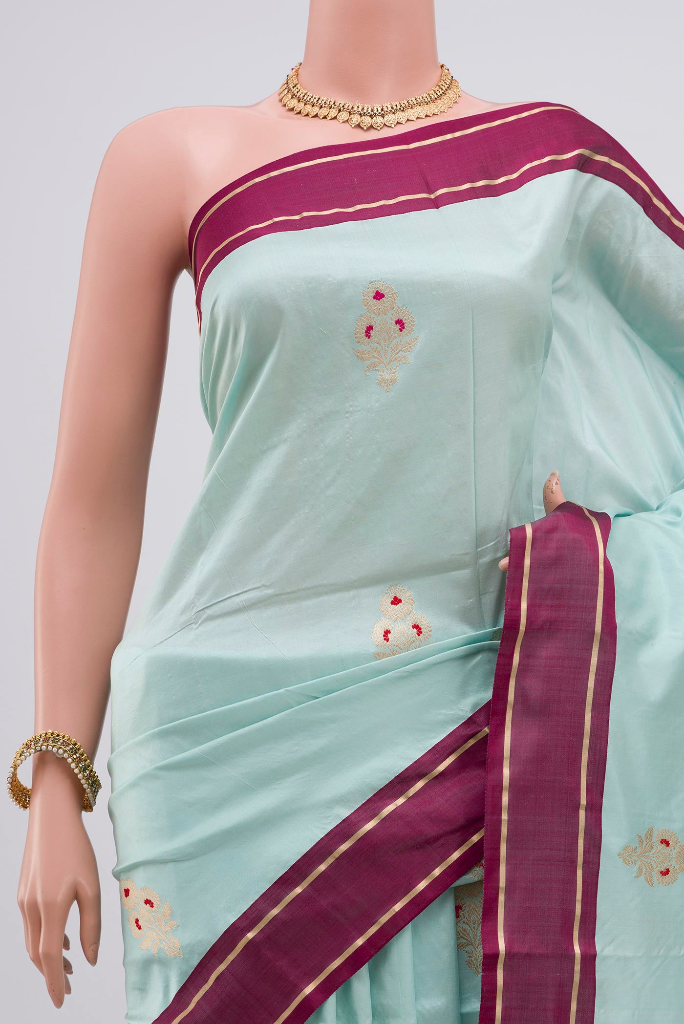 Border image of Light Blue Banarasi Katan Silk Saree with Zari Butta on the body and Plain Border. 