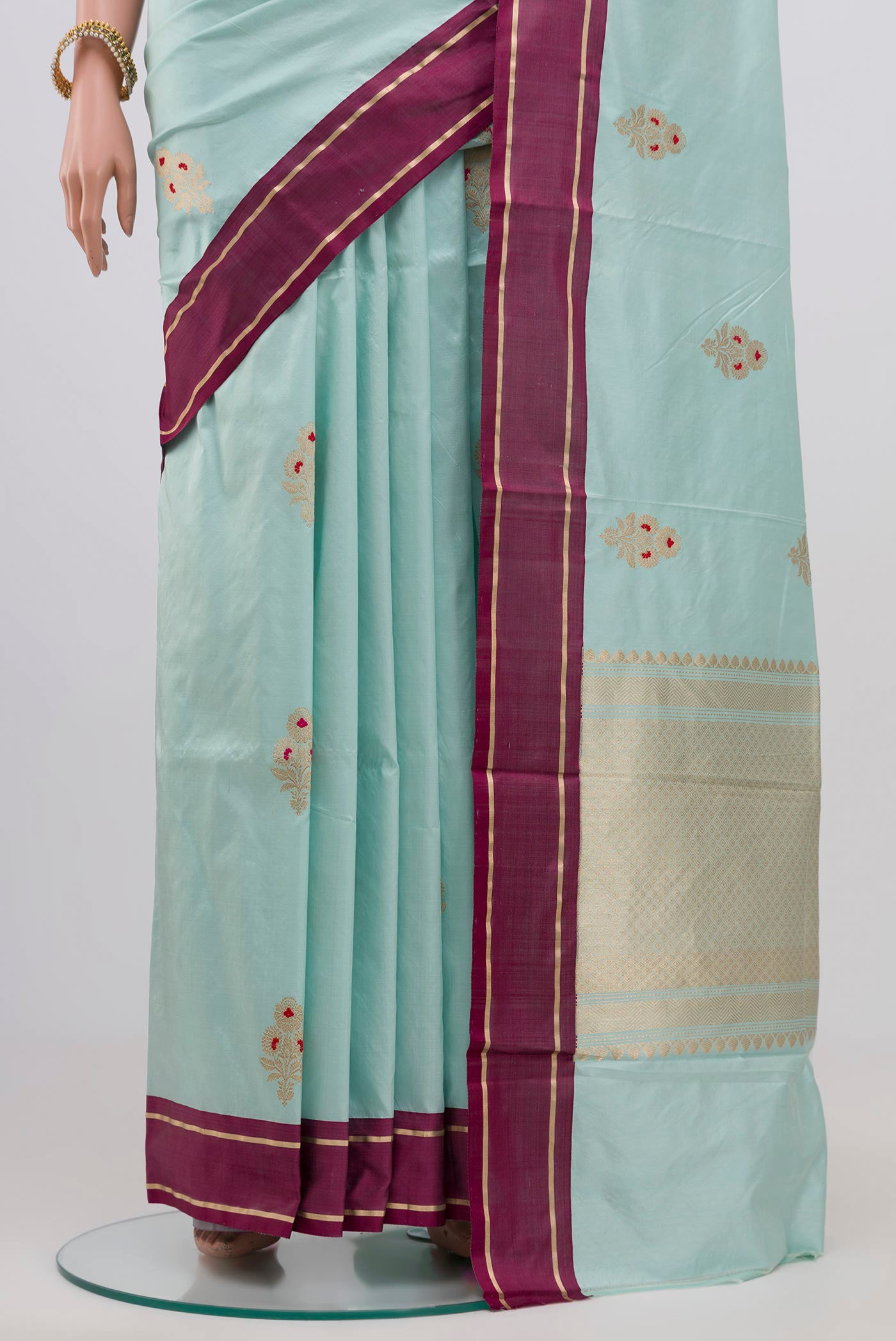 Pleats and pallu of Light Blue Banarasi Katan Silk Saree with Zari Butta on the body and Plain Border. 