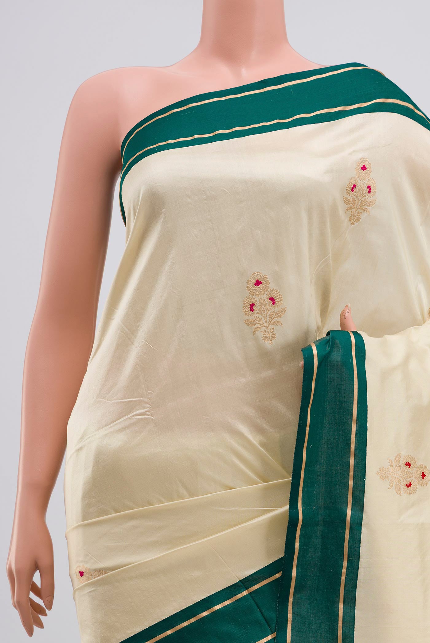 Border image of Cream Banarasi Katan Silk Saree with Zari Butta on the body and Thin Zari Line. 