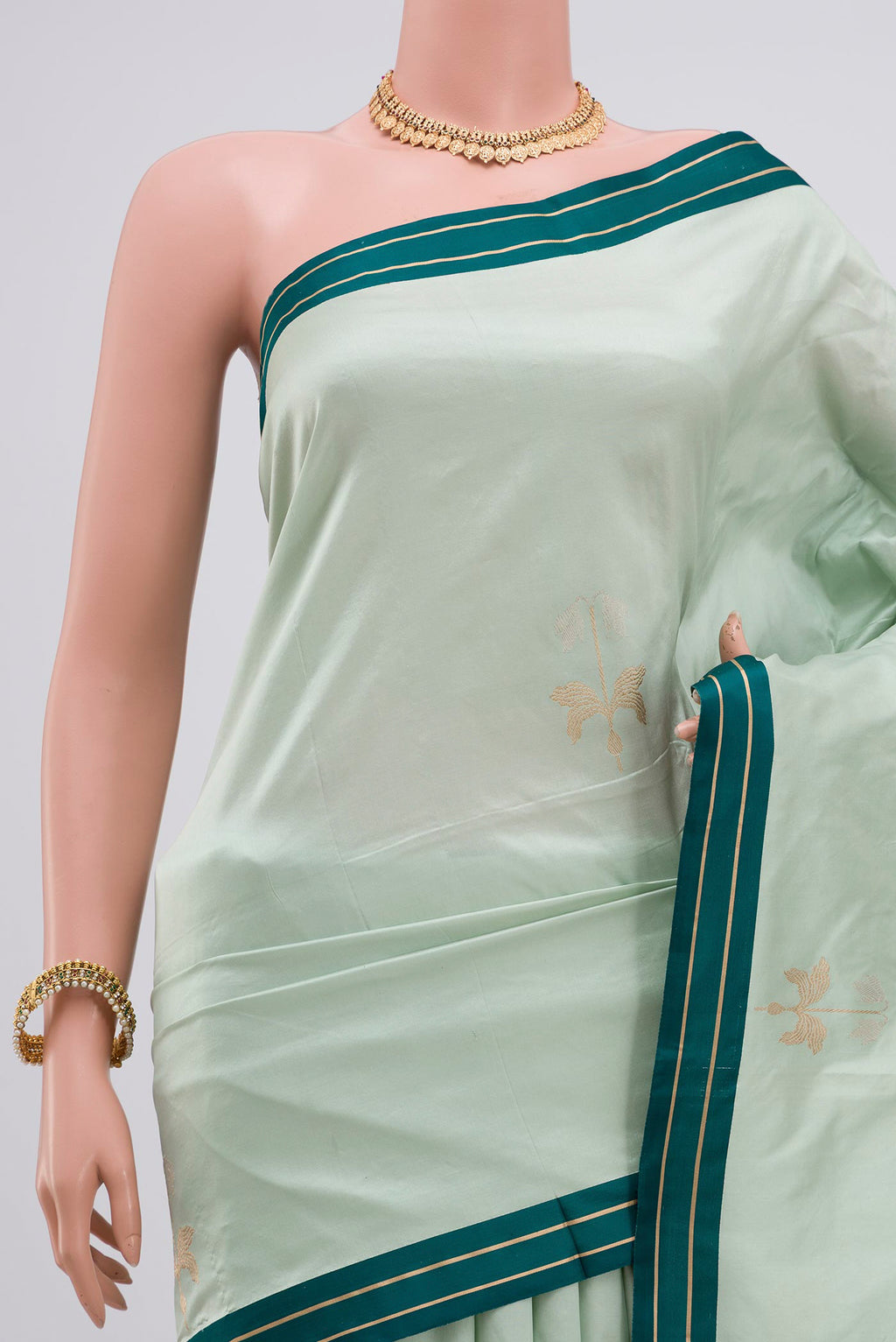 Border image of Light Blue Banarasi Katan Silk Saree with Zari Butta on the body and Plain Border. 