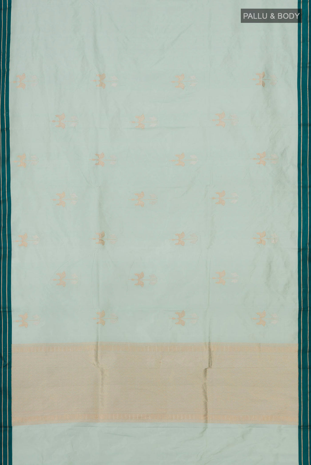 Flat view of Light Blue Banarasi Katan Silk Saree with Zari Butta on the body and Plain Border. 