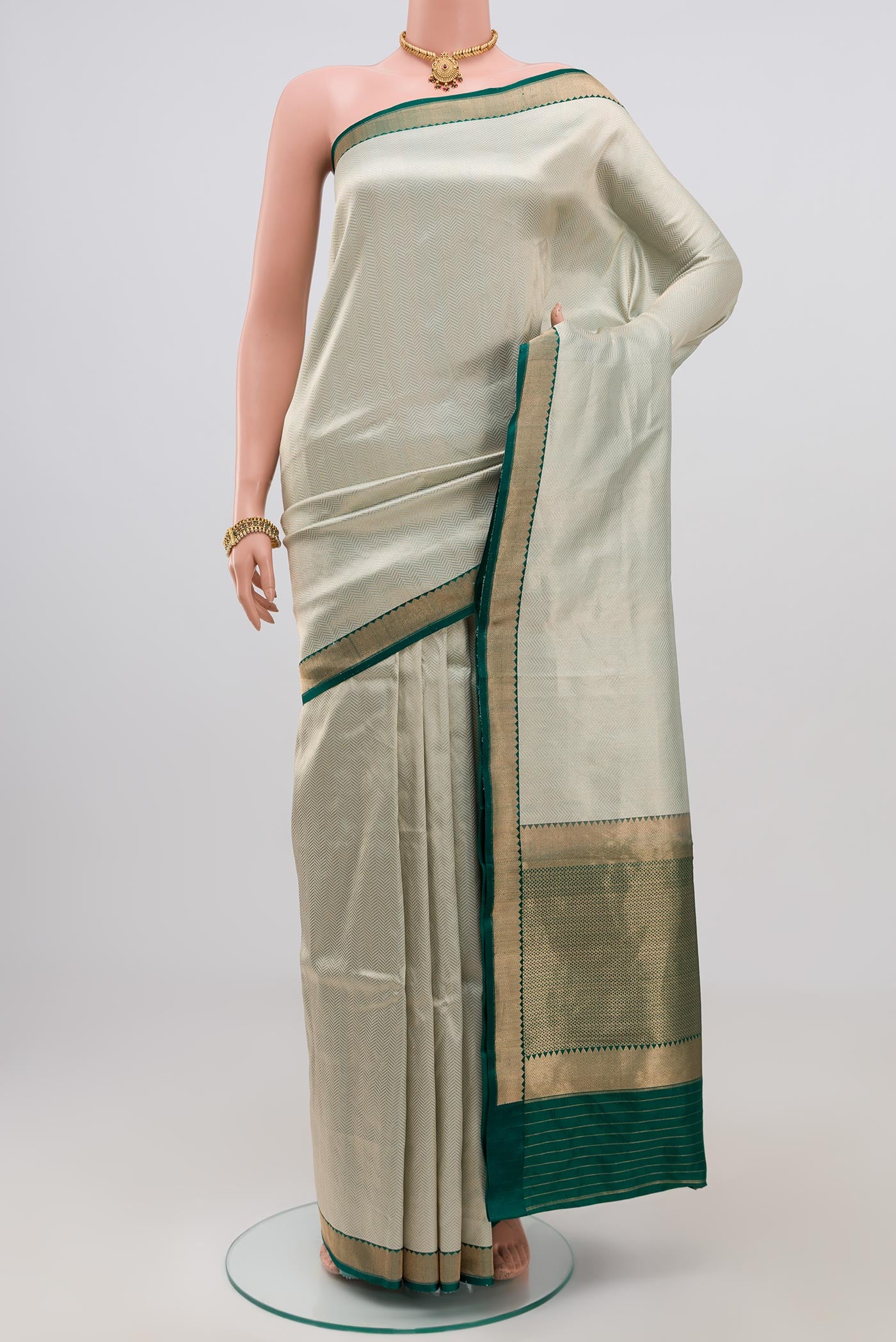 Blue Banarasi Katan Silk Saree with Zari Brocade on the body and Zari Border.  displayed on a mannequin