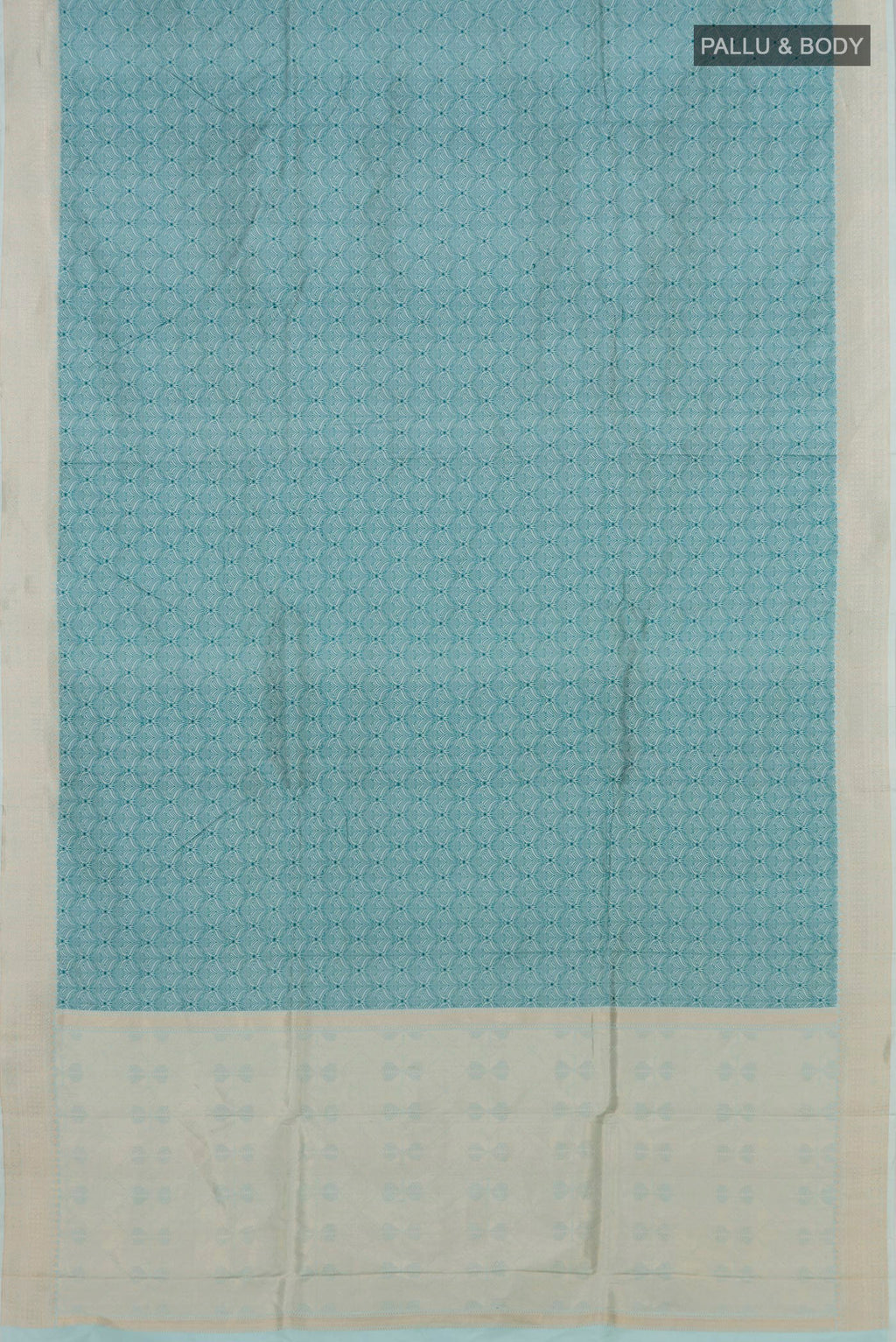 Flat view of Light Blue Banarasi Katan Silk Saree with Jacquard design on the body and Zari Border. 