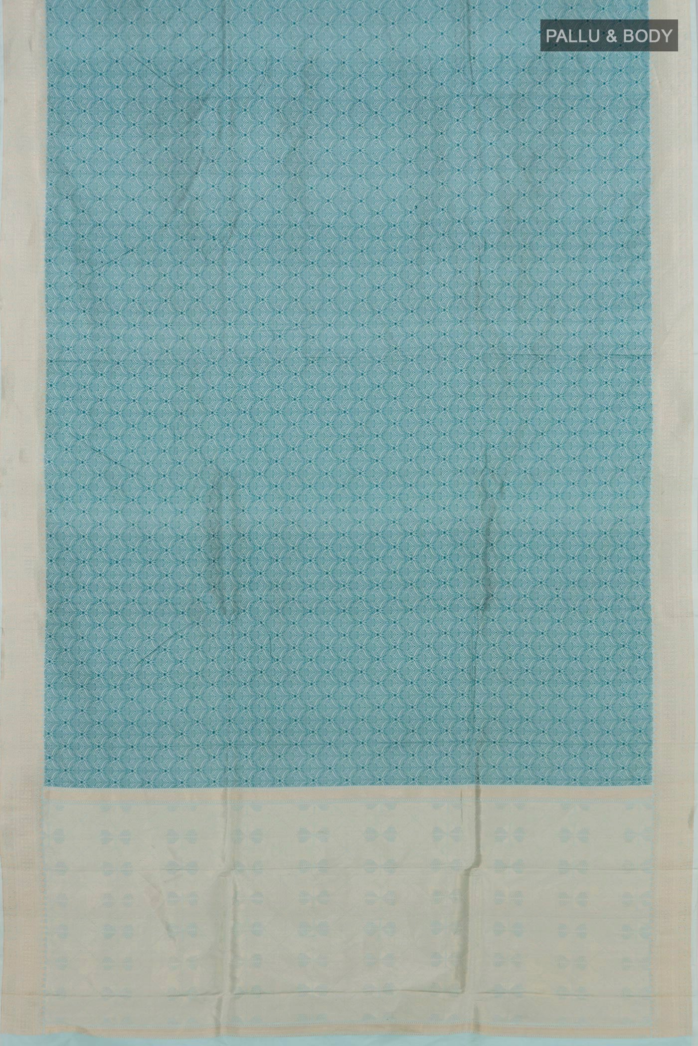 Flat view of Light Blue Banarasi Katan Silk Saree with Jacquard design on the body and Zari Border. 