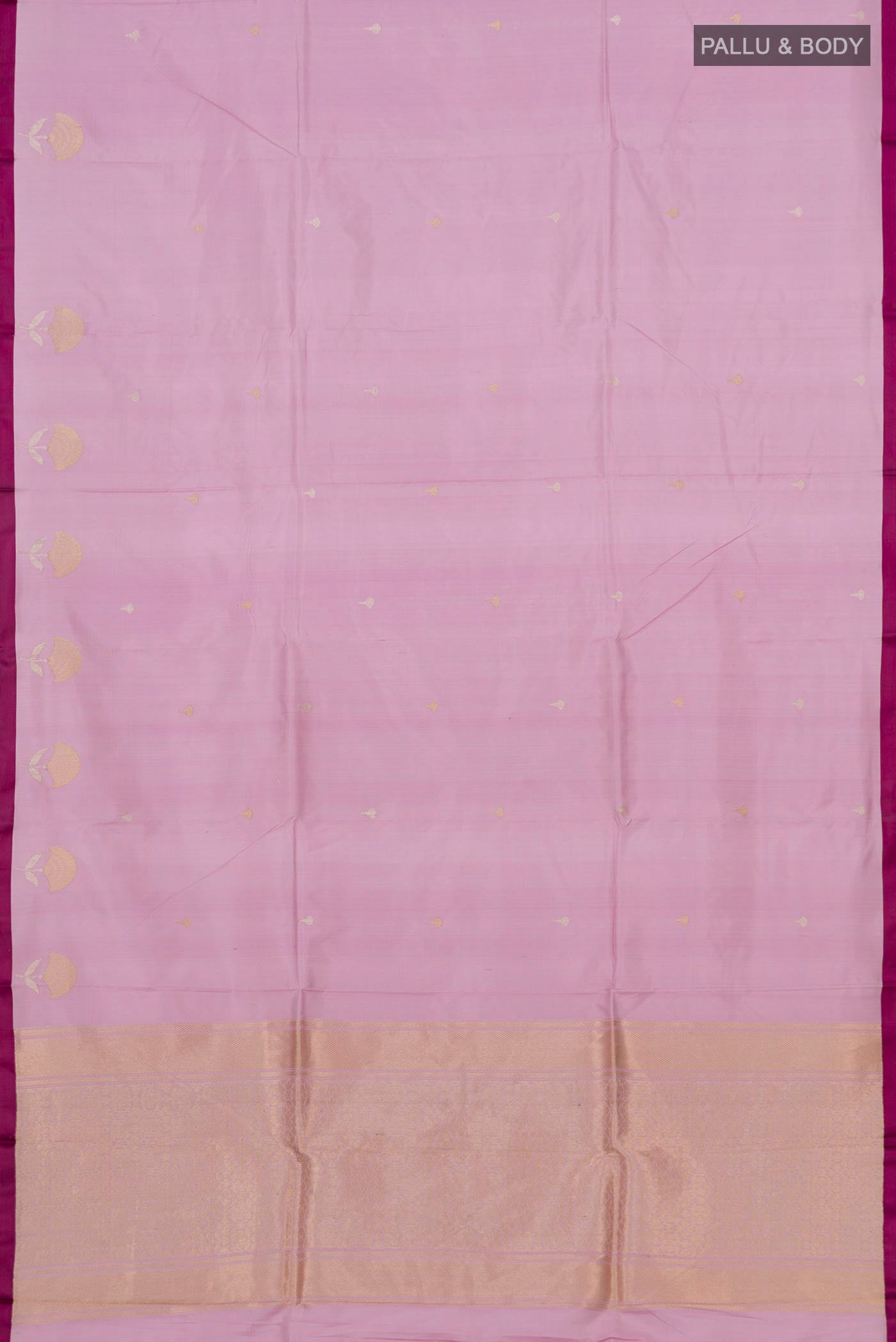 Flat view of Lavender Banarasi Katan Silk Saree with Zari Butta on the body and Plain Border. 
