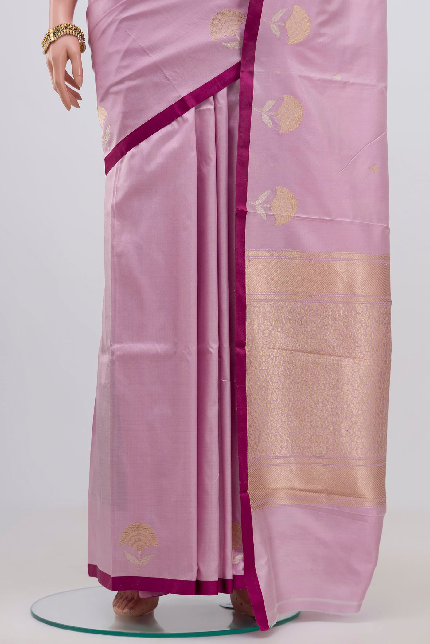Pleats and pallu of Lavender Banarasi Katan Silk Saree with Zari Butta on the body and Plain Border. 