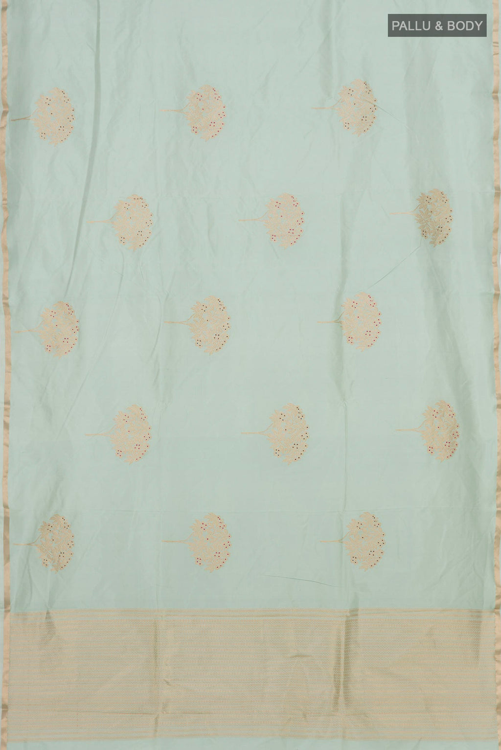 Flat view of Light Green Banarasi Katan Silk Saree with Zari Butta on the body and Thin Zari Line. 