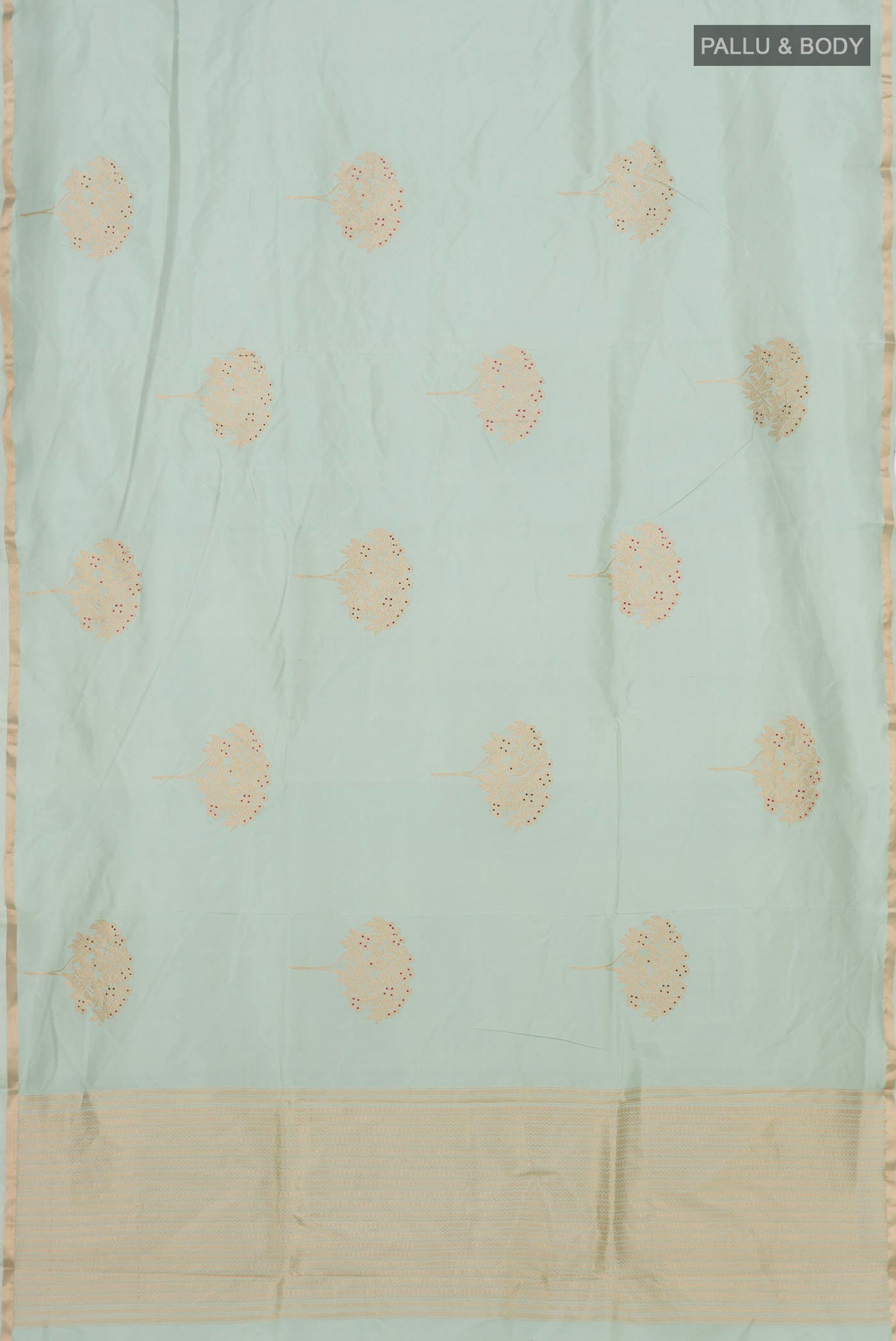 Flat view of Light Green Banarasi Katan Silk Saree with Zari Butta on the body and Thin Zari Line. 