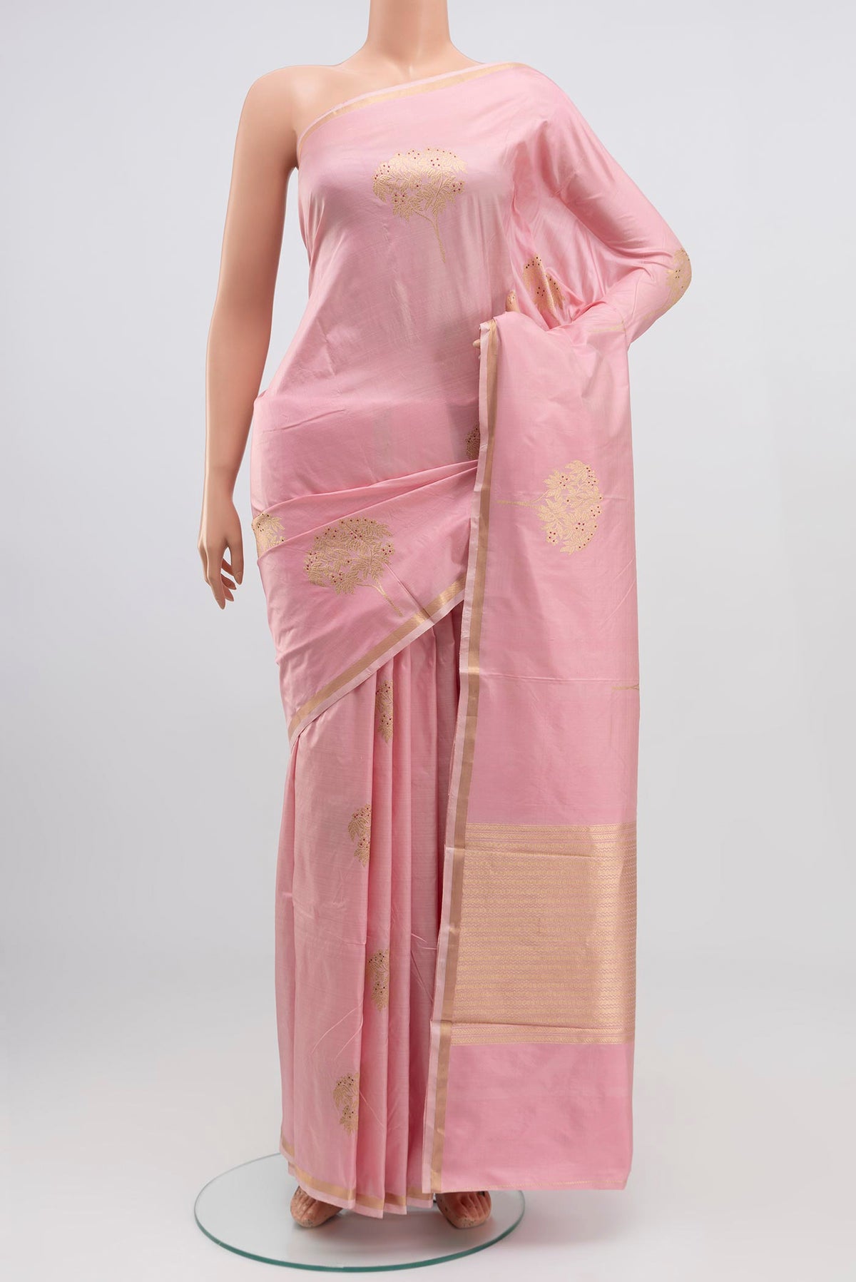 Pink Banarasi Katan Silk Saree with Zari Butta on the body and Thin Zari Line.  displayed on a mannequin
