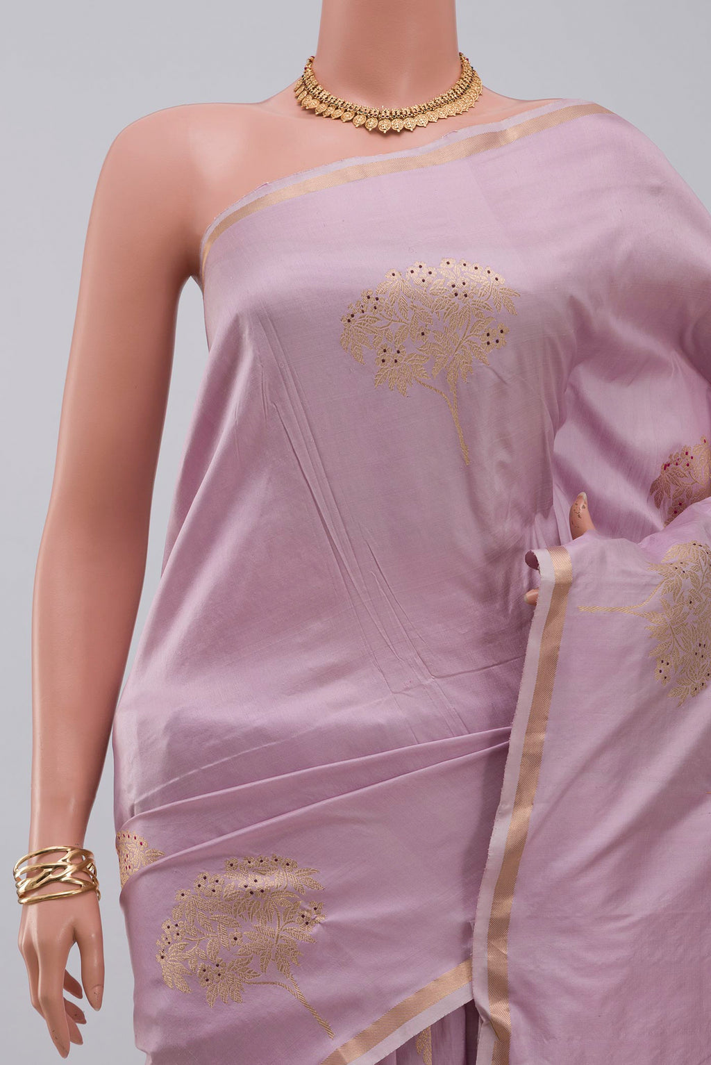 Border image of Lavender Banarasi Katan Silk Saree with Zari Butta on the body and Thin Zari Line. 