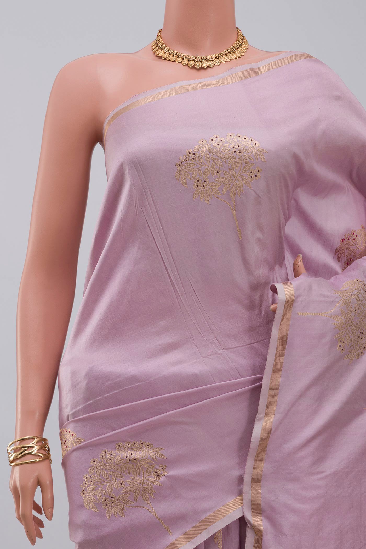 Border image of Lavender Banarasi Katan Silk Saree with Zari Butta on the body and Thin Zari Line. 