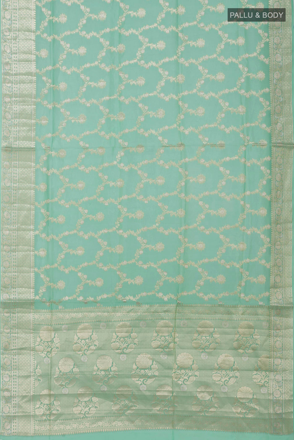Flat view of Light Green Raw Silk Saree with Zari Butta on the body and Zari Border. 