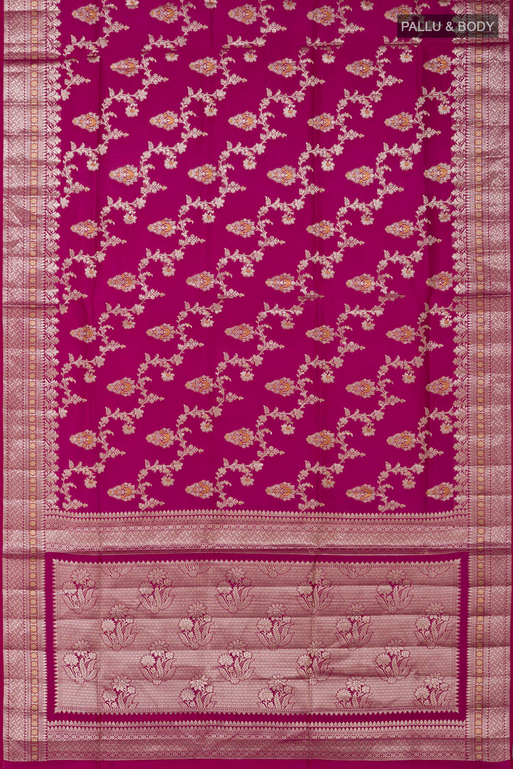 Flat view of Rani Pink Raw Silk Saree with Zari Butta on the body and Zari Border. 