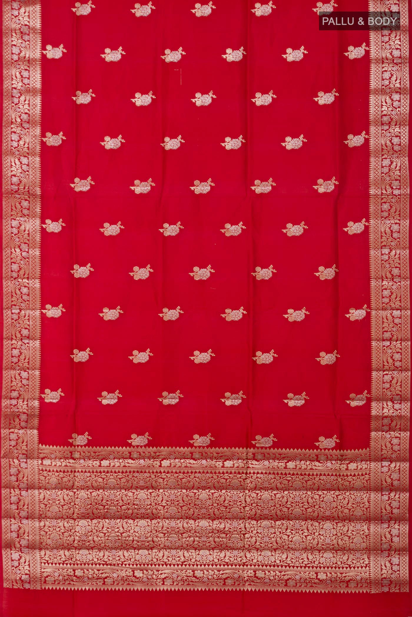 Flat view of Red Raw Silk Saree with Zari Butta on the body and Zari Border. 