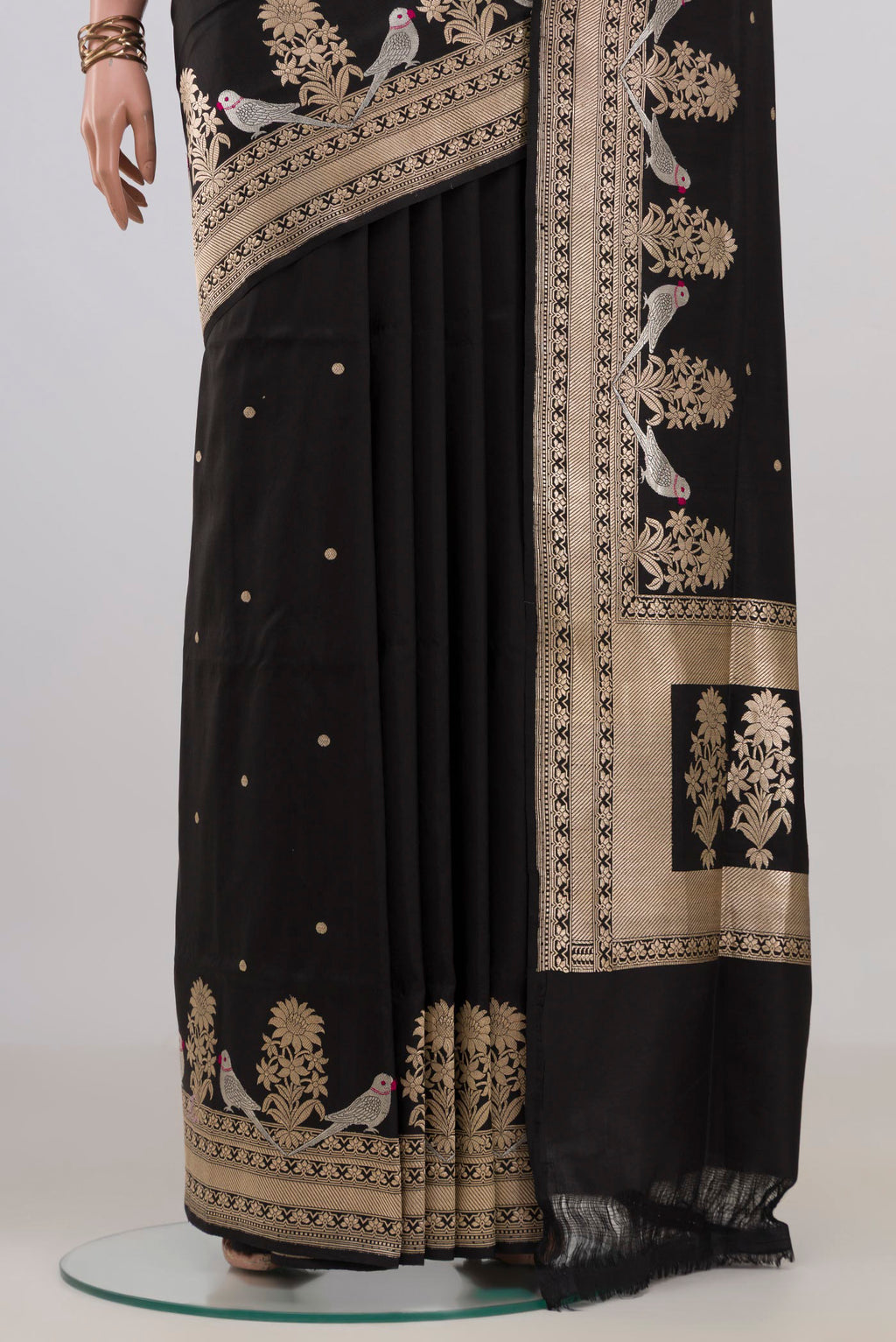 Pleats and pallu of Pure Silk Black Banarasi Saree with Zari Butta on the body and Fancy Border. 