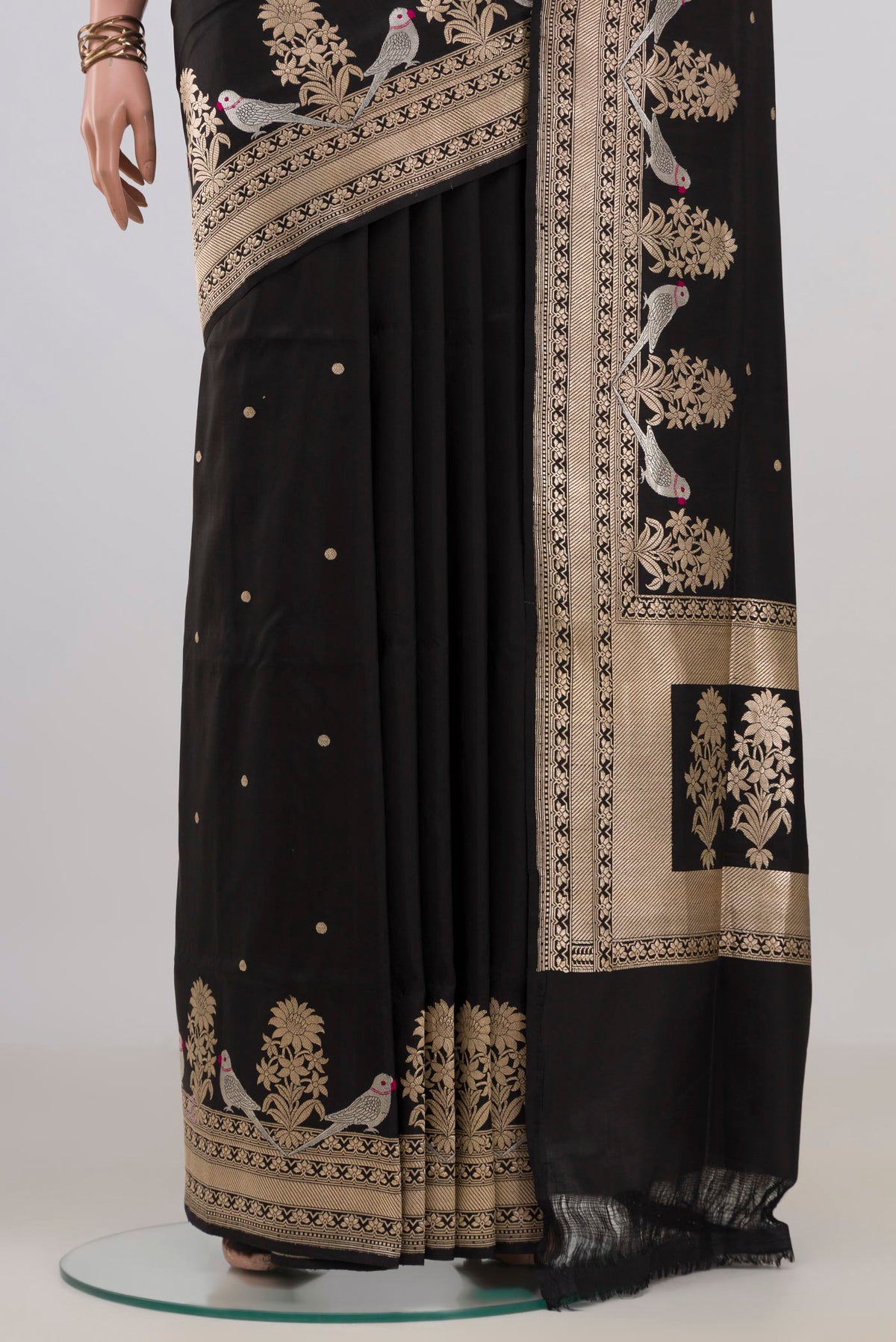 Pleats and pallu of Pure Silk Black Banarasi Saree with Zari Butta on the body and Fancy Border. 