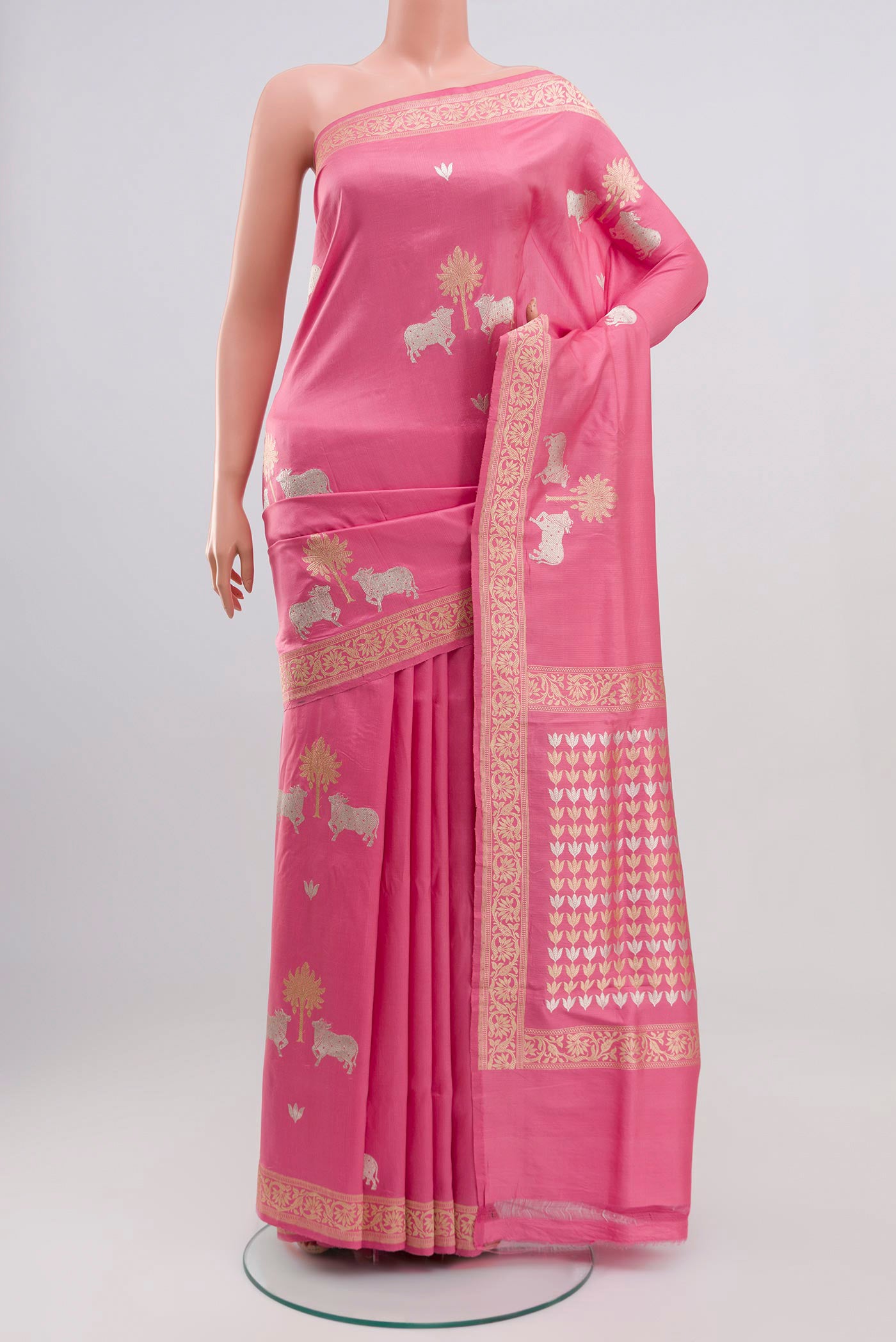 Pink Banarasi Saree with Fancy on the body and Zari Border.  displayed on a mannequin