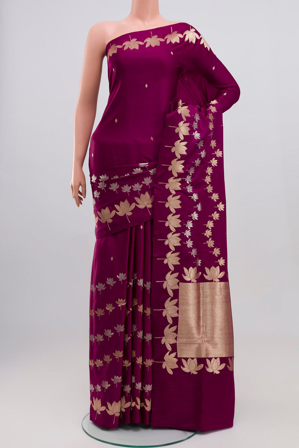 Purple Banarasi Silk Saree with Zari Butta on the body and Fancy Border.  displayed on a mannequin