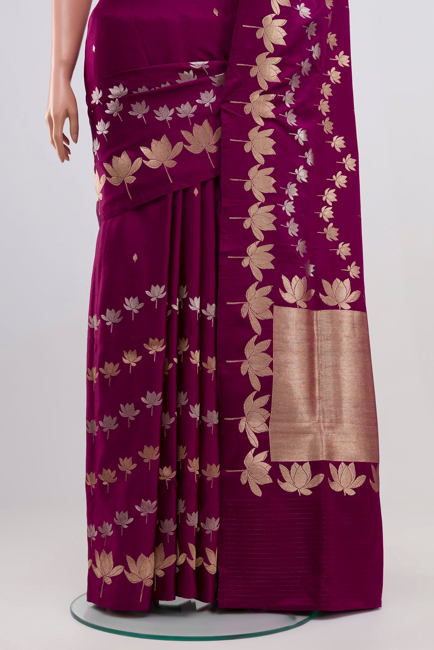 Pleats and pallu of Purple Banarasi Silk Saree with Zari Butta on the body and Fancy Border. 