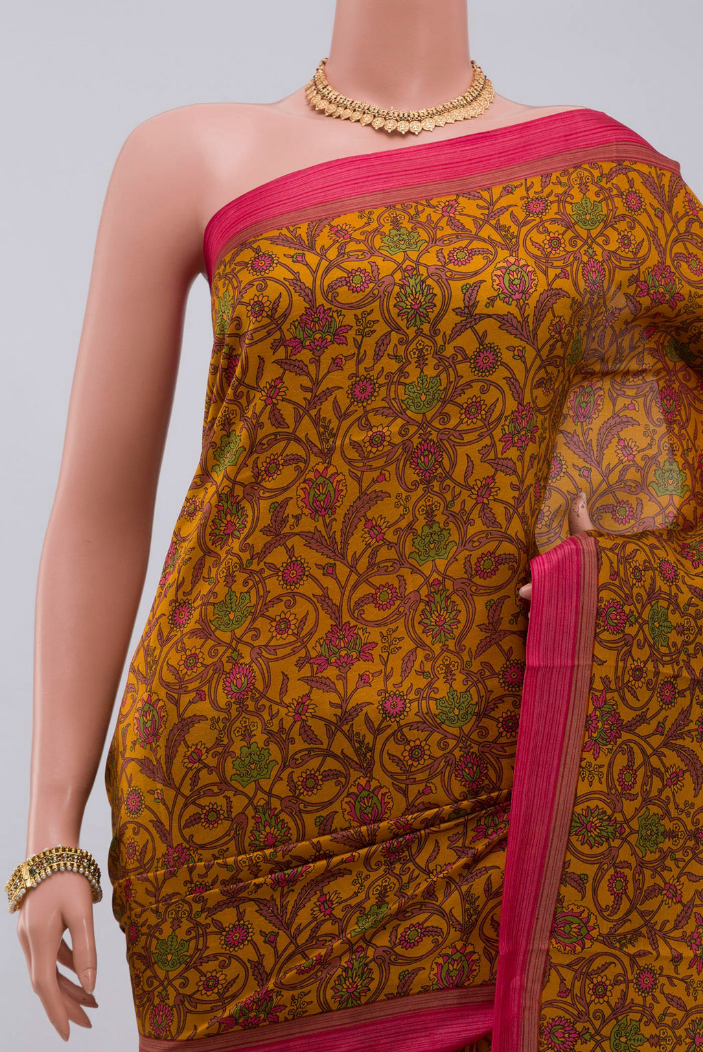 Border image of Yellow Printed Silk Saree with Printed design on the body and Plain Border. 
