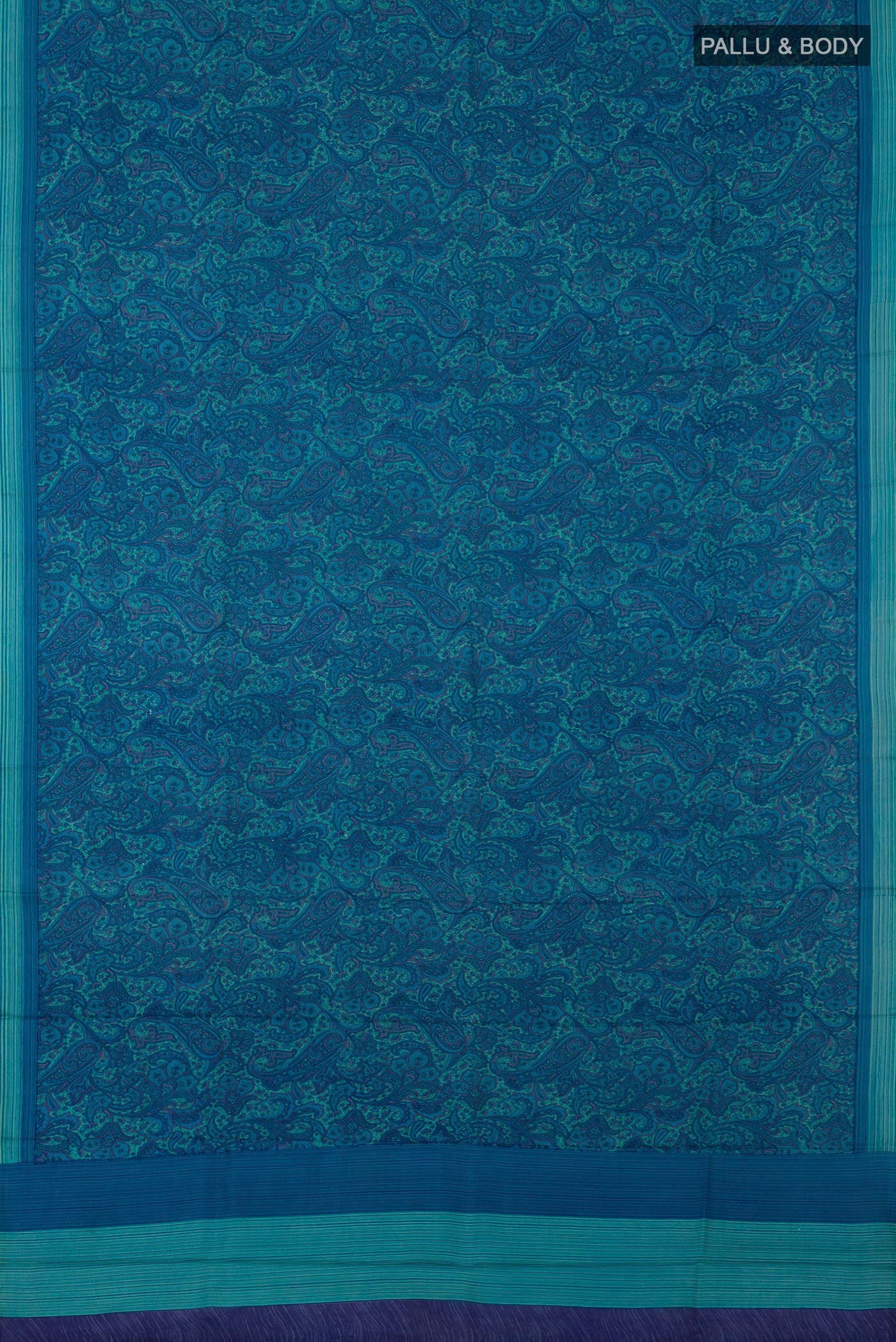 Flat view of Blue Printed Silk Saree with Printed design on the body and Plain Border. 