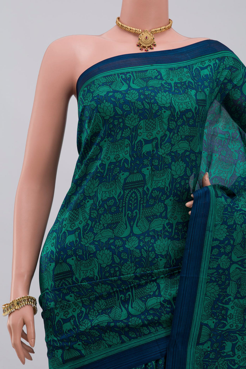 Border image of Blue Printed Silk Saree with Printed design on the body and Plain Border. 