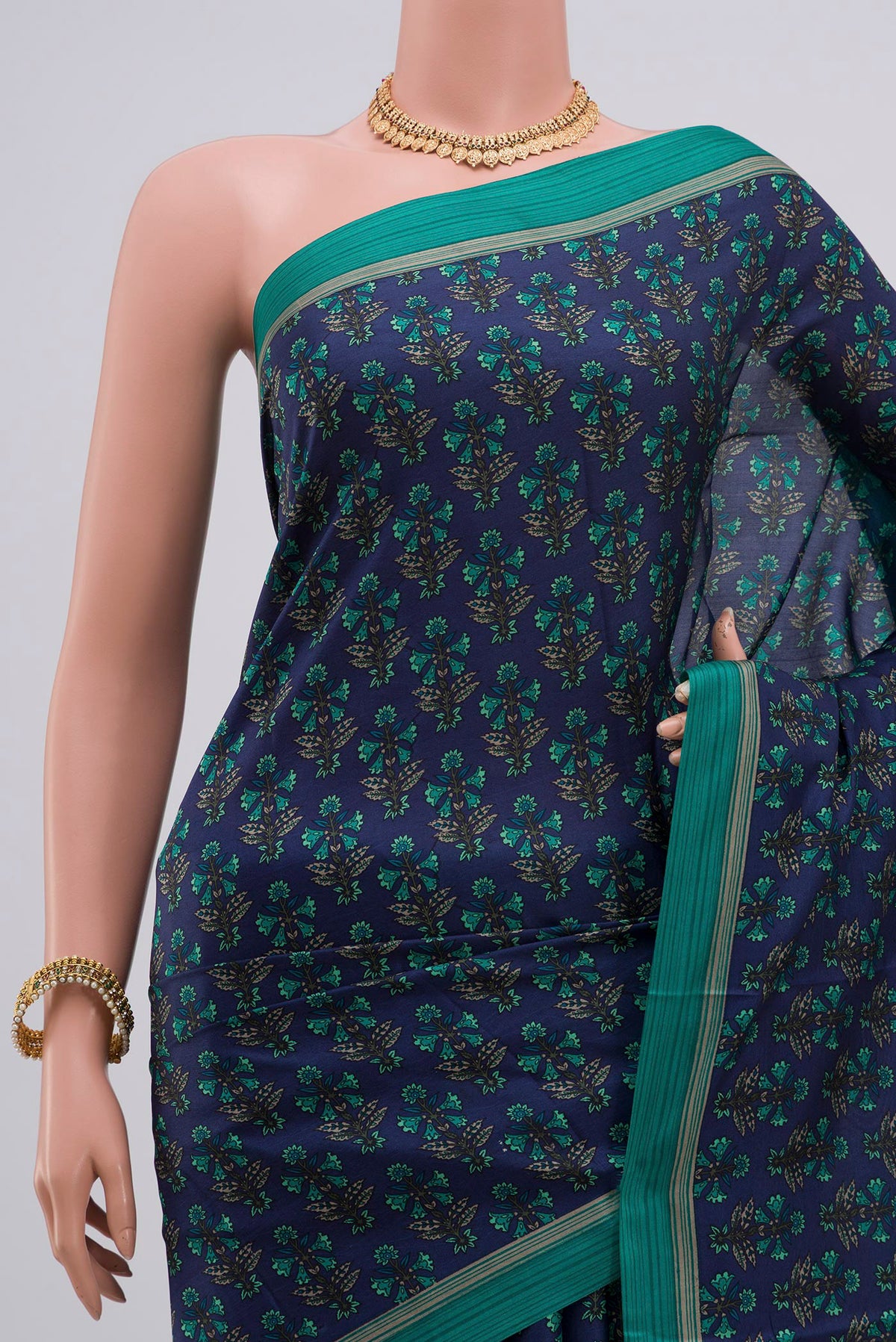 Border image of Blue Printed Silk Saree with Printed design on the body and Plain Border. 
