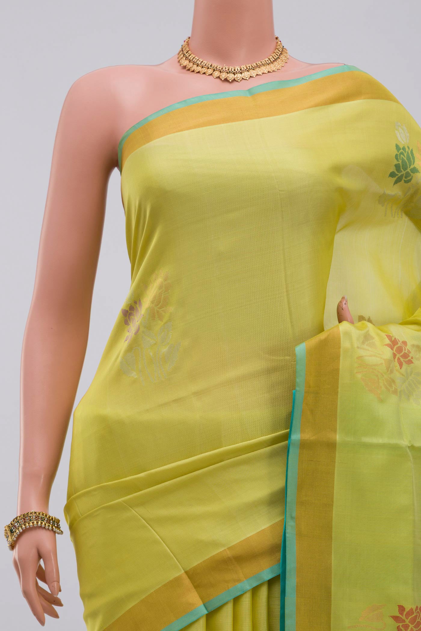 Border image of Yellow Uppada Silk Saree with Zari Butta on the body and Zari Border. 