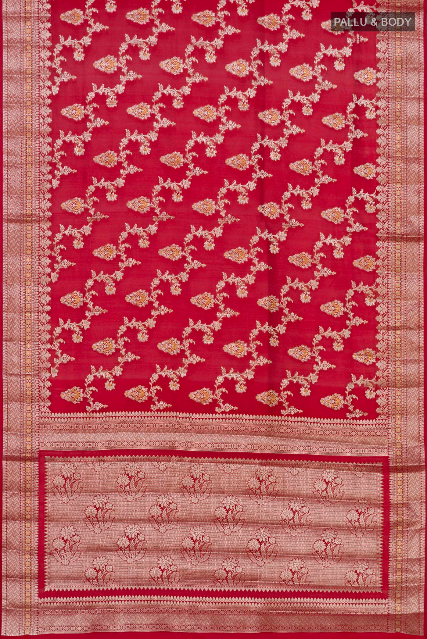 Flat view of Red Raw Silk Saree with Zari Butta on the body and Zari Border. 