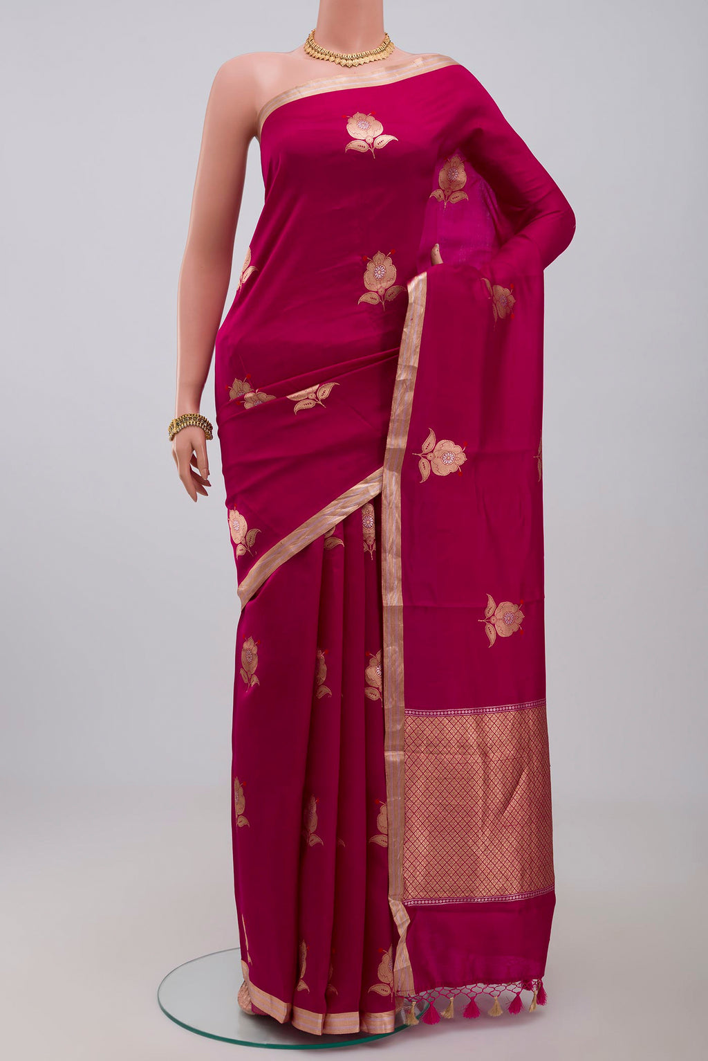 Pink Banarasi Katan Silk Saree with Zari Butta on the body and Zari Border.  displayed on a mannequin