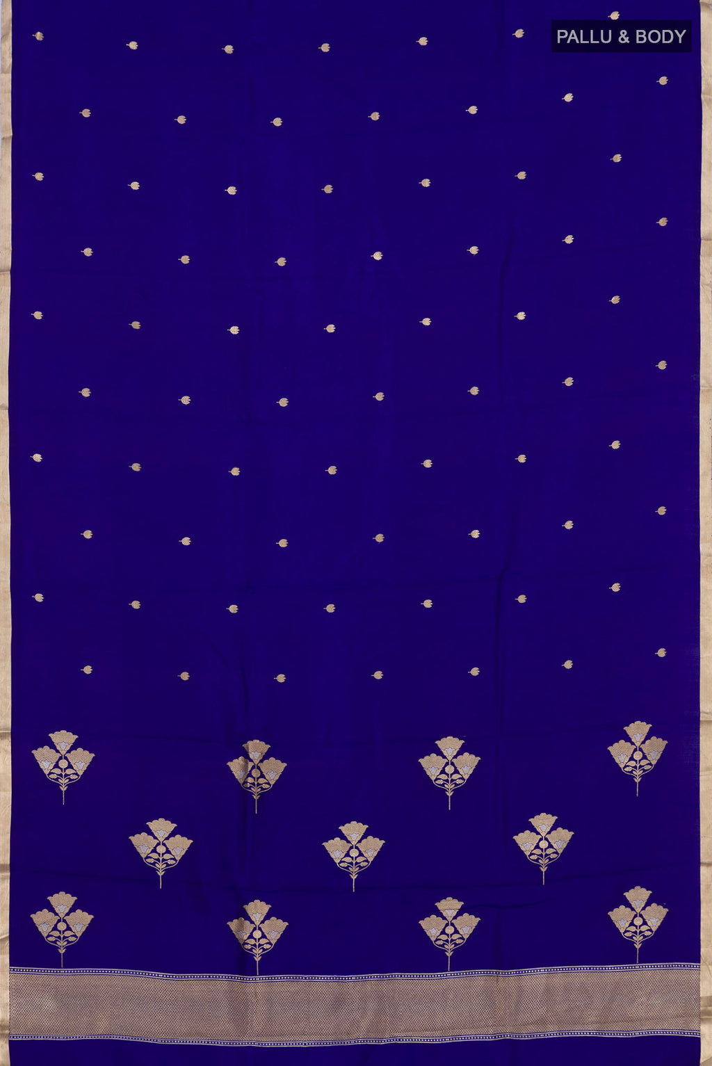 Flat view of Dark Blue Banarasi Katan Silk Saree with Zari Butta on the body and Zari Border. 