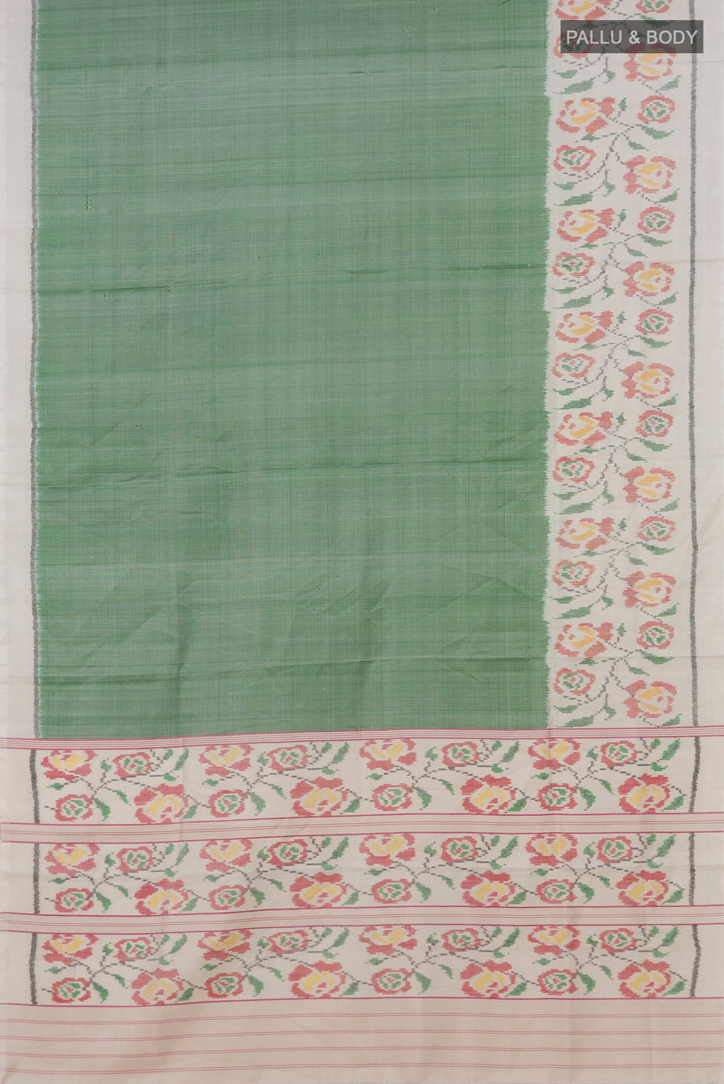 Flat view of Light Green Rajkot Patola Silk Saree with Plain Body and Plain Border. 
