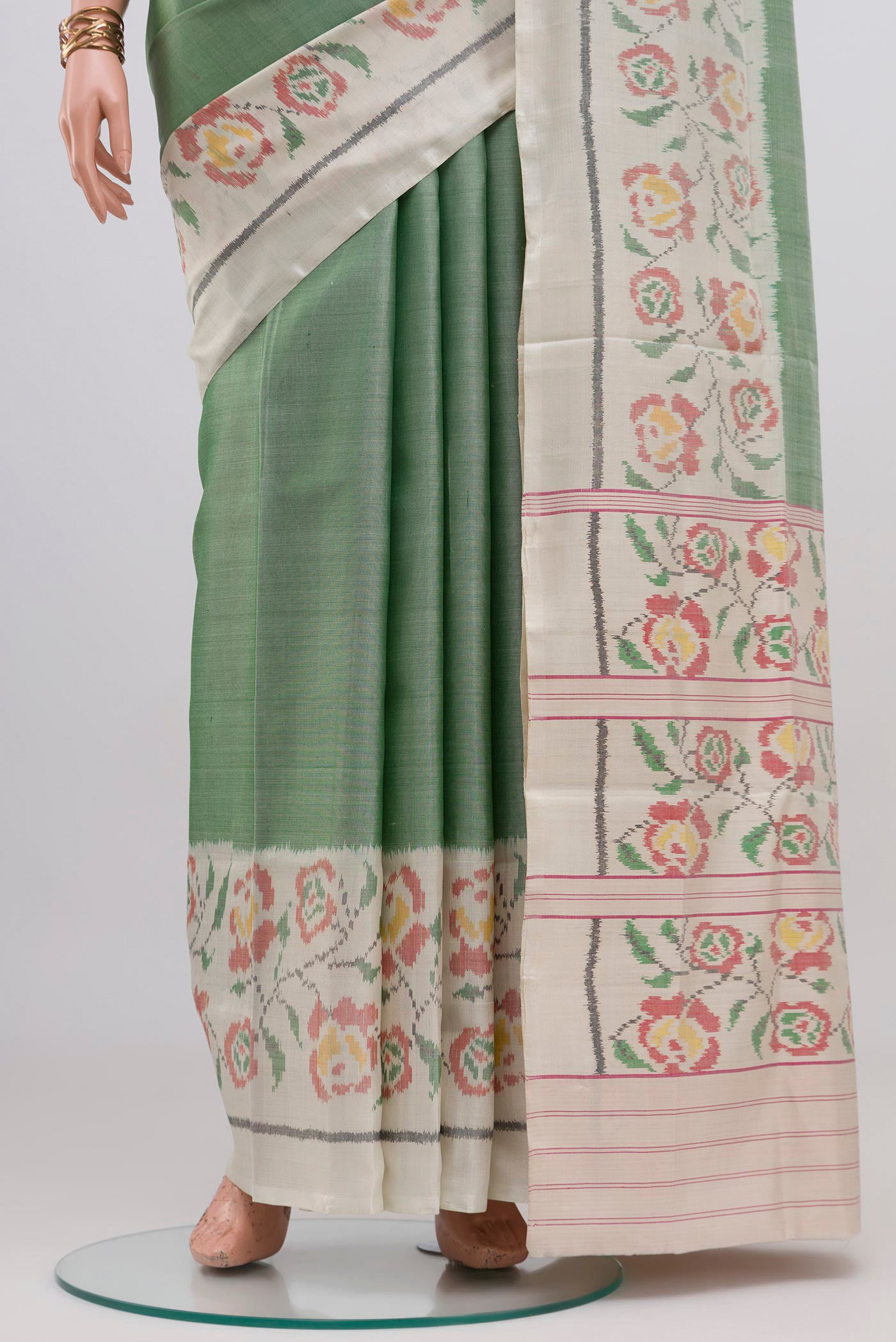 Pleats and pallu of Light Green Rajkot Patola Silk Saree with Plain Body and Plain Border. 