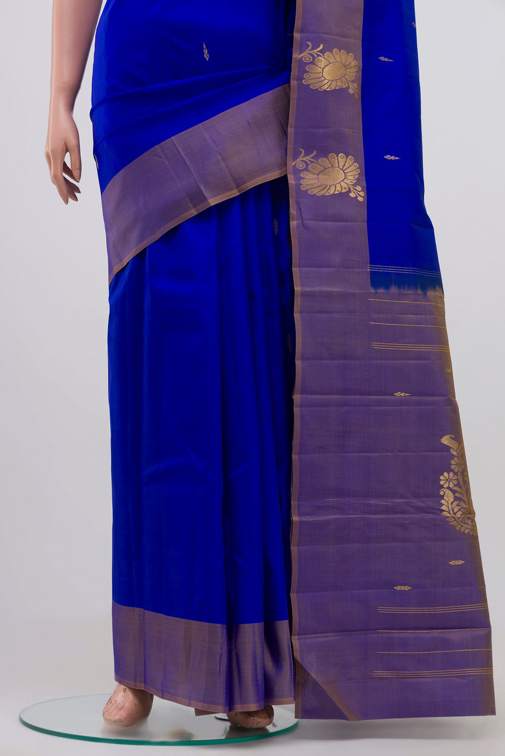 Pleats and pallu of Royal Blue Kanchipuram Silk Saree with Zari Butta on the body and Zari Border. 