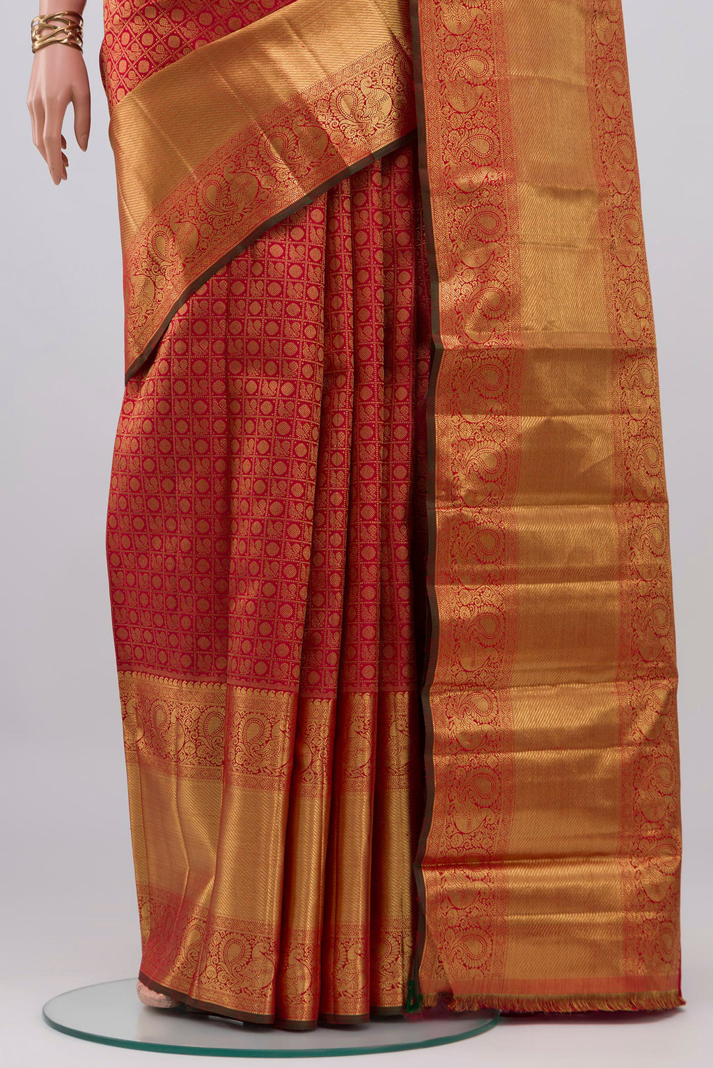Pleats and pallu of Pure Silk Pure Zari Red Kanjivaram Saree with Zari Brocade on the body and Zari Border. 
