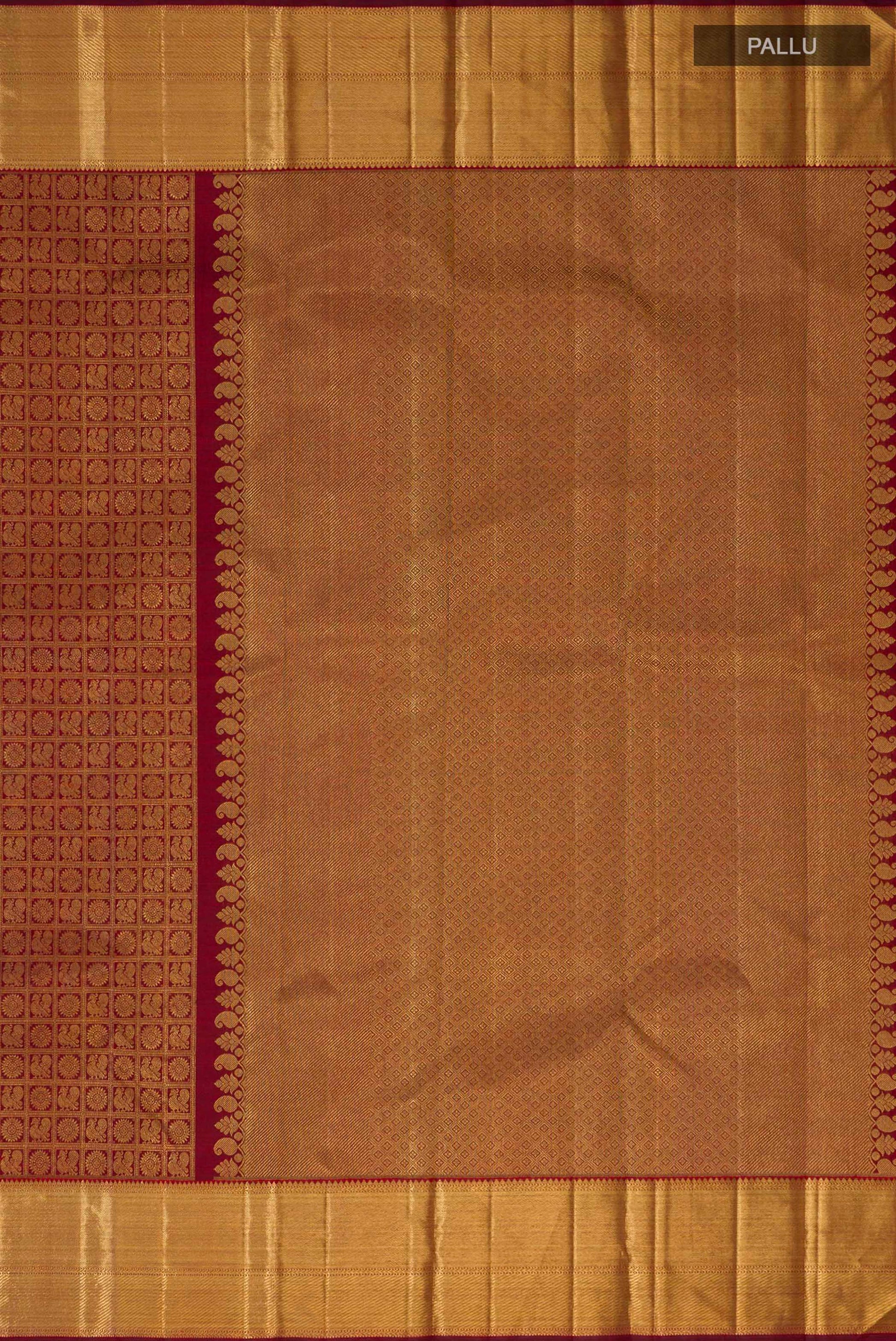 Close up image of the pallu of Pure Silk Pure Zari Maroon Kanjivaram Saree with Zari Brocade on the body and Zari Border. 