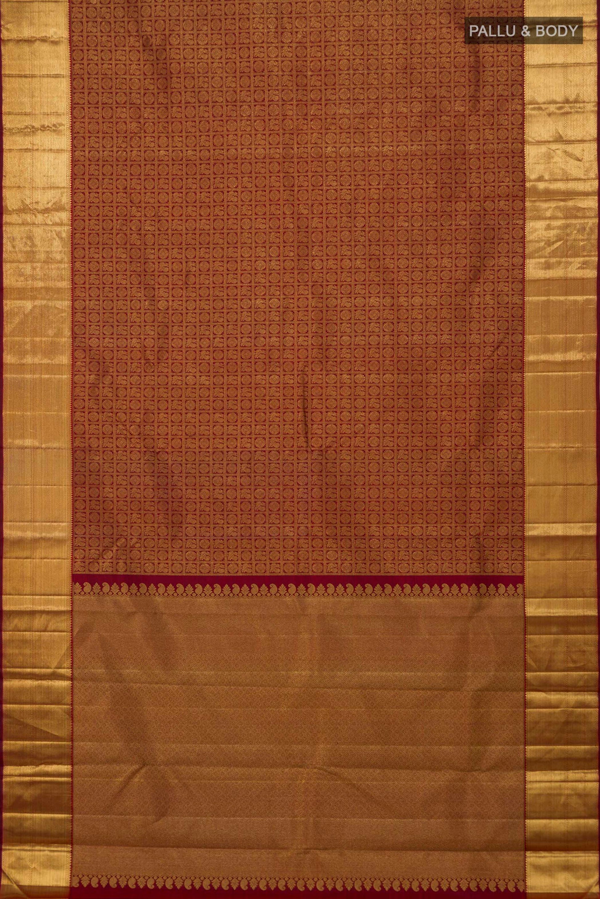 Flat view of Pure Silk Pure Zari Maroon Kanjivaram Saree with Zari Brocade on the body and Zari Border. 