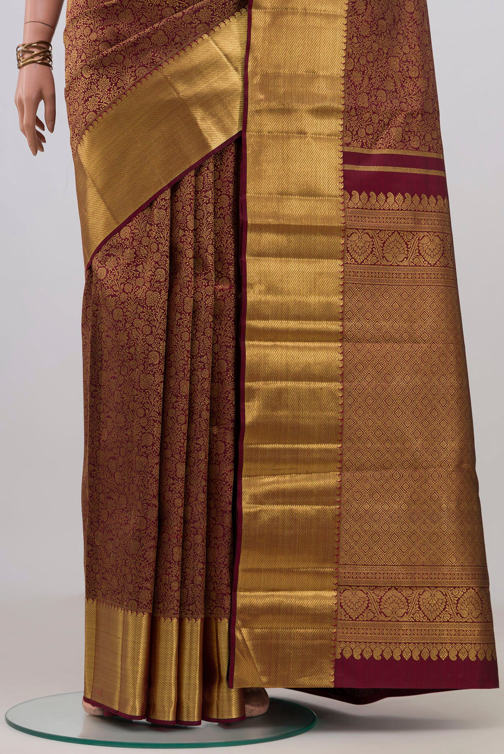 Pleats and pallu of Pure Silk Pure Zari Coffee Brown Kanjivaram Saree with Zari Brocade on the body and Zari Border. 